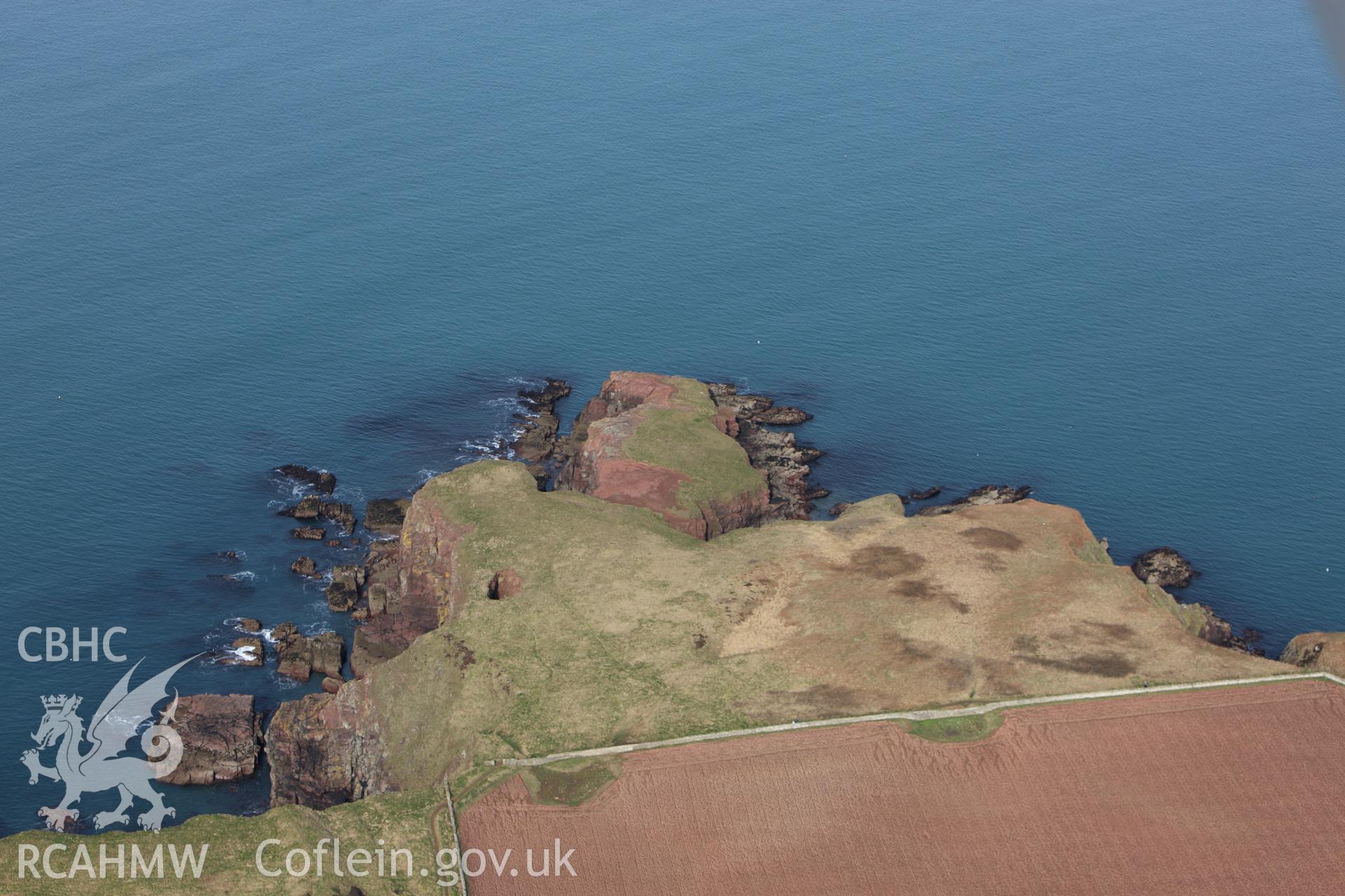 RCAHMW colour oblique aerial photograph of Nab Head promontary. Taken on 02 March 2010 by Toby Driver