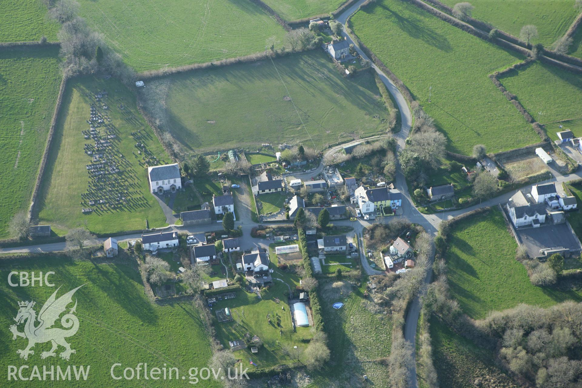 RCAHMW colour oblique aerial photograph of Tre Hywel Stone near Glan-Dwr Independent Chapel. Taken on 13 April 2010 by Toby Driver