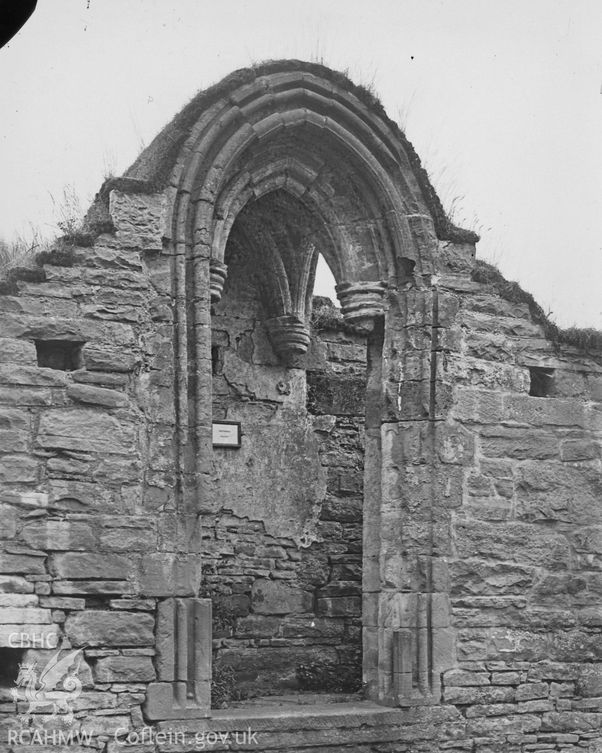 Digital copy of a view of arched recess in wall at Tintern Abbey.