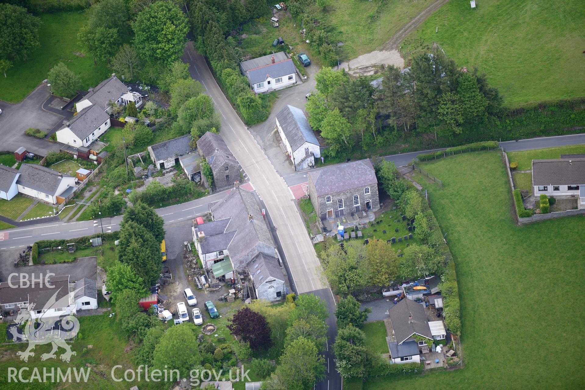 The village of Rhydowen, showing Yr Hen Gapel; Allyrodyn Arms and Alltyrodyn Arms pigsty and stable. Oblique aerial photograph taken during the Royal Commission's programme of archaeological aerial reconnaissance by Toby Driver on 3rd June 2015.