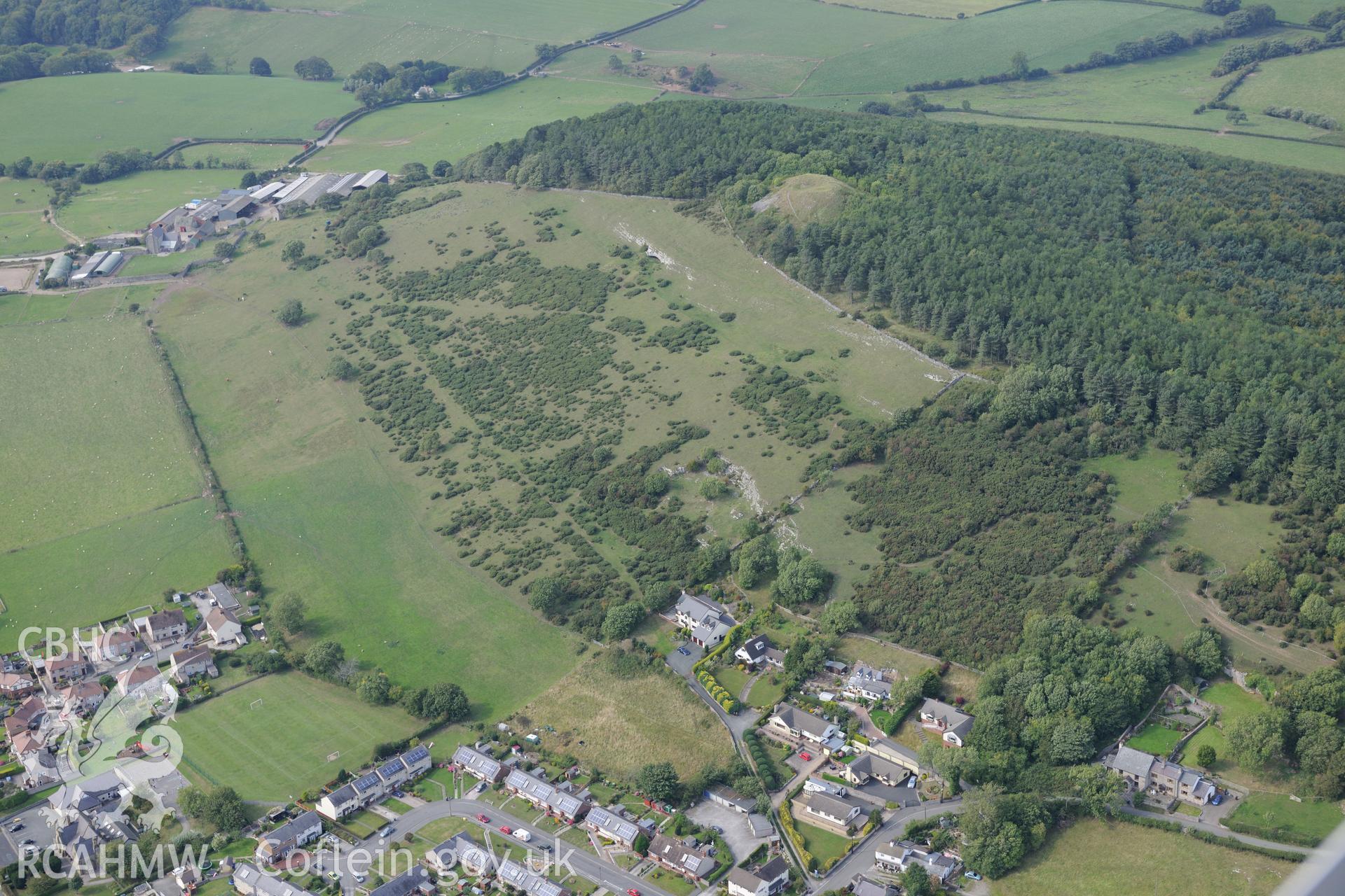 Gop Farm and Gop Hill cairn, Trelawnyd, near St. Asaph. Oblique aerial photograph taken during the Royal Commission's programme of archaeological aerial reconnaissance by Toby Driver on 11th September 2015.