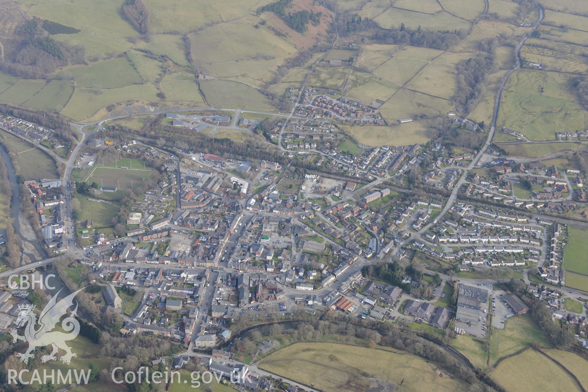 The town of Llanidloes, viewed from the north west. Oblique aerial photograph taken during the Royal Commission?s programme of archaeological aerial reconnaissance by Toby Driver on 28th February 2013.