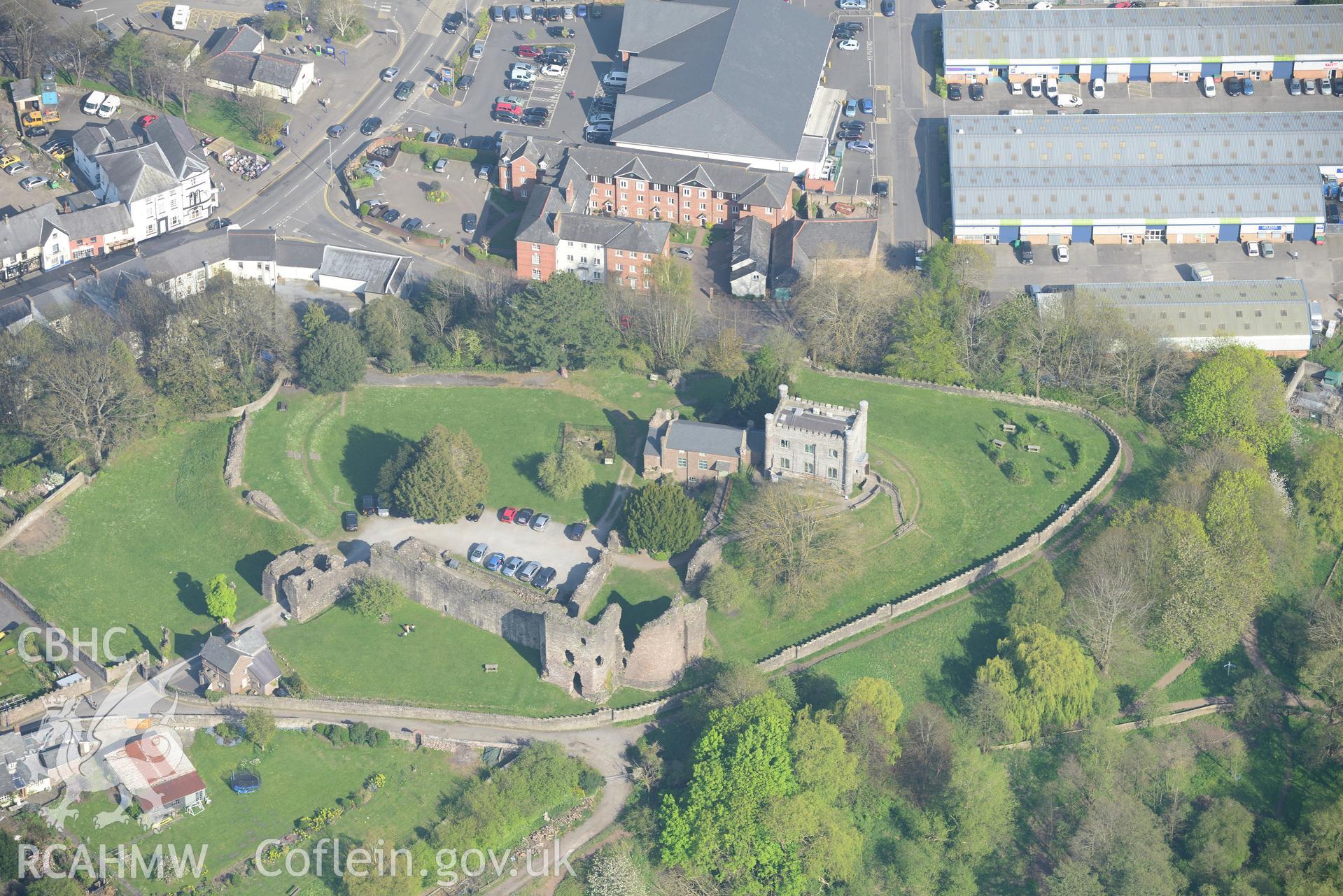 Abergavenny including the castle, castle garden and castle museum; corn mill; tannery and Lulworth House. Oblique aerial photograph taken during the Royal Commission's programme of archaeological aerial reconnaissance by Toby Driver on 21st April 2015.
