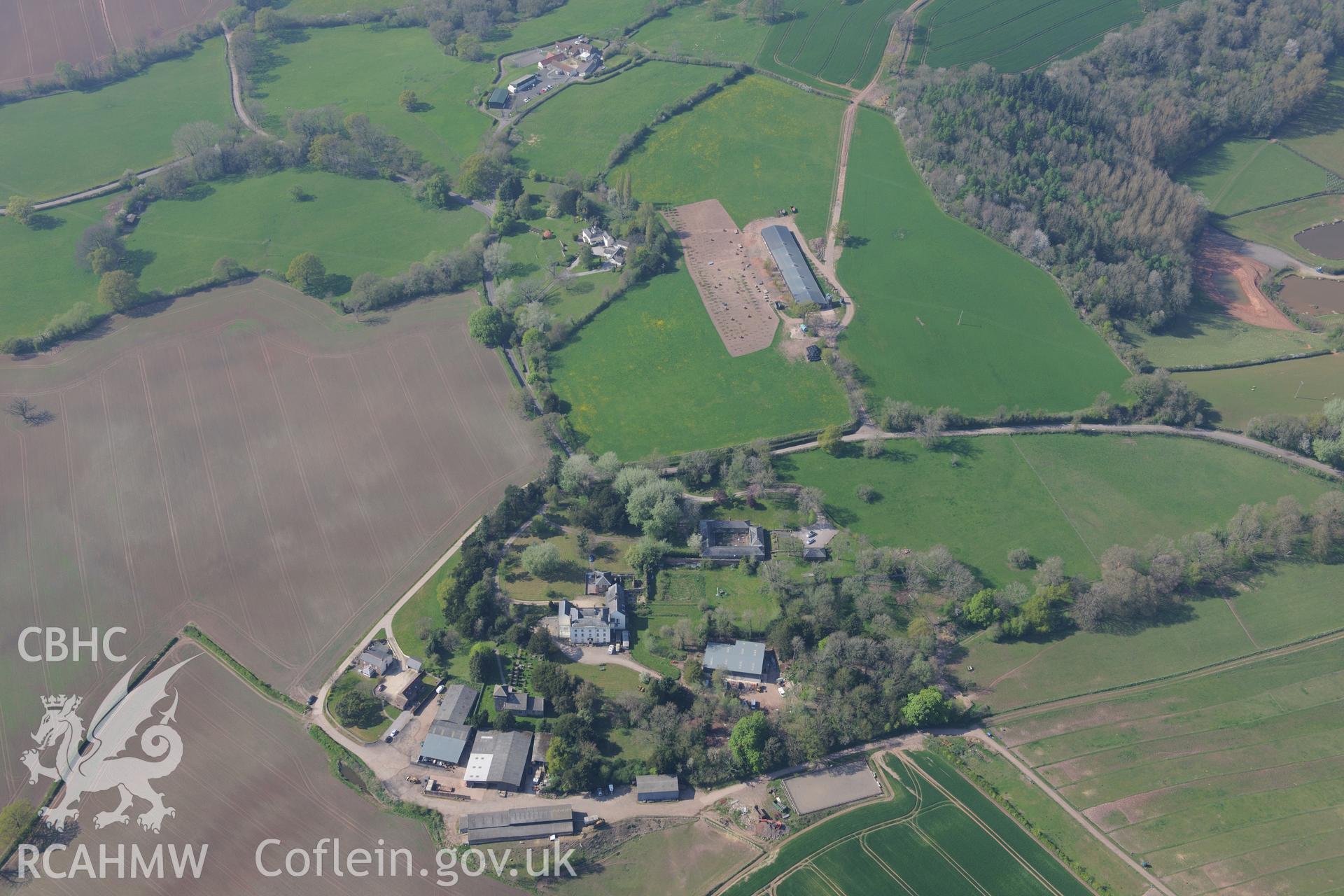Wonastow Court and Garden, St Wonnow's Church and Vicarage, and Talocher Farm Roman Fort. Oblique aerial photograph taken during the Royal Commission's programme of archaeological aerial reconnaissance by Toby Driver on 21st April 2015