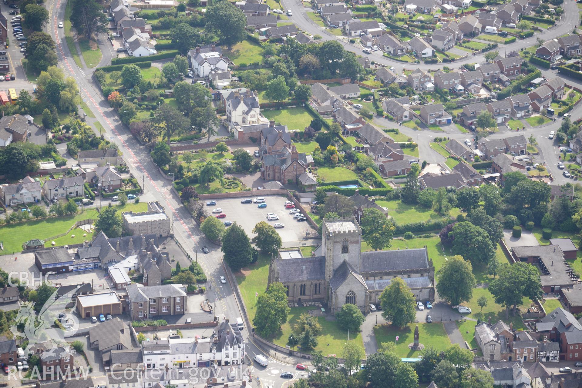 St. Asaph Cathedral and the Bishop William Morgan Memorial in the city of St. Asaph. Oblique aerial photograph taken during the Royal Commission's programme of archaeological aerial reconnaissance by Toby Driver on 11th September 2015.