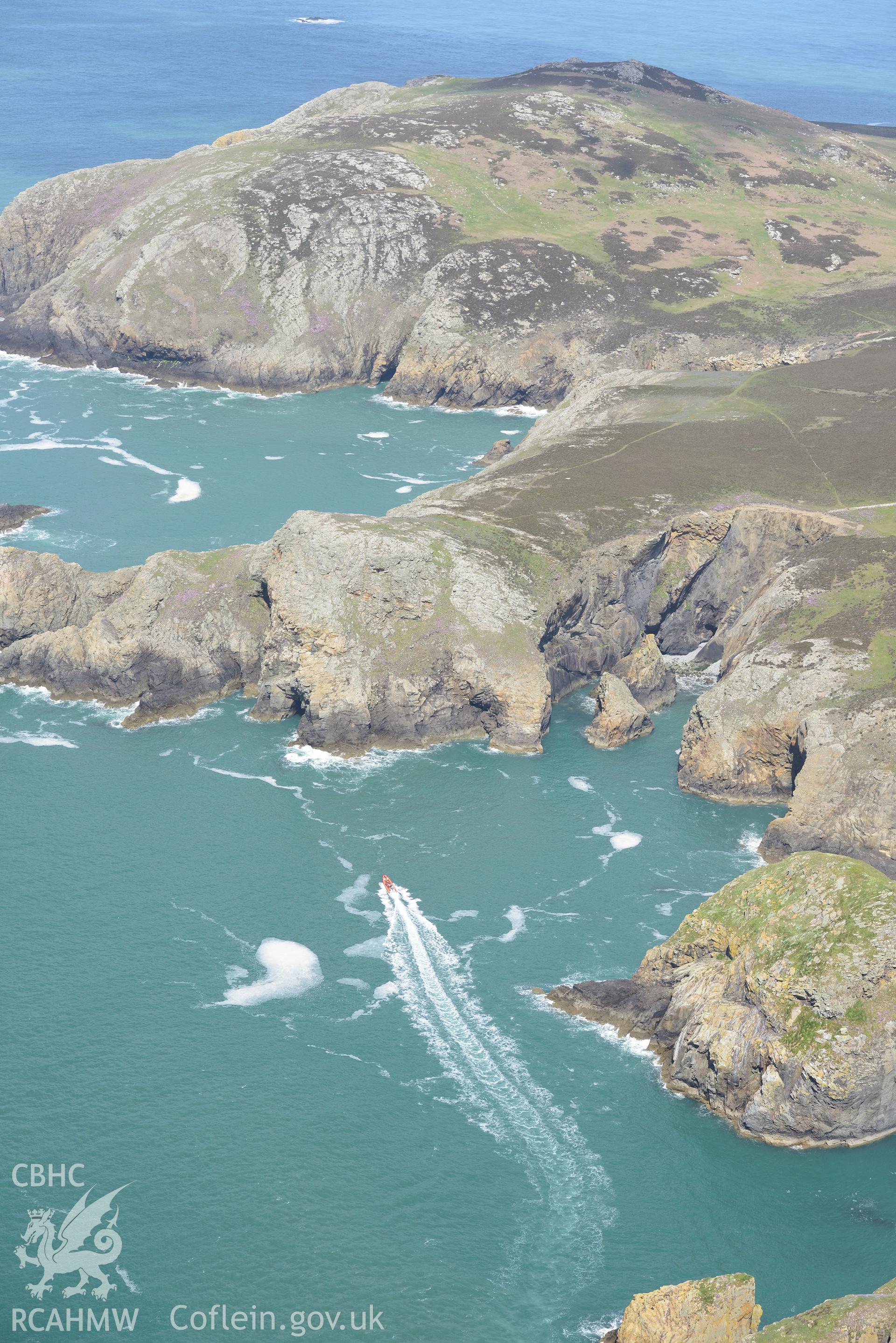 Ogof Thomas Williams on Ramsey Island, off the coast near St Davids. Oblique aerial photograph taken during the Royal Commission's programme of archaeological aerial reconnaissance by Toby Driver on 13th May 2015.
