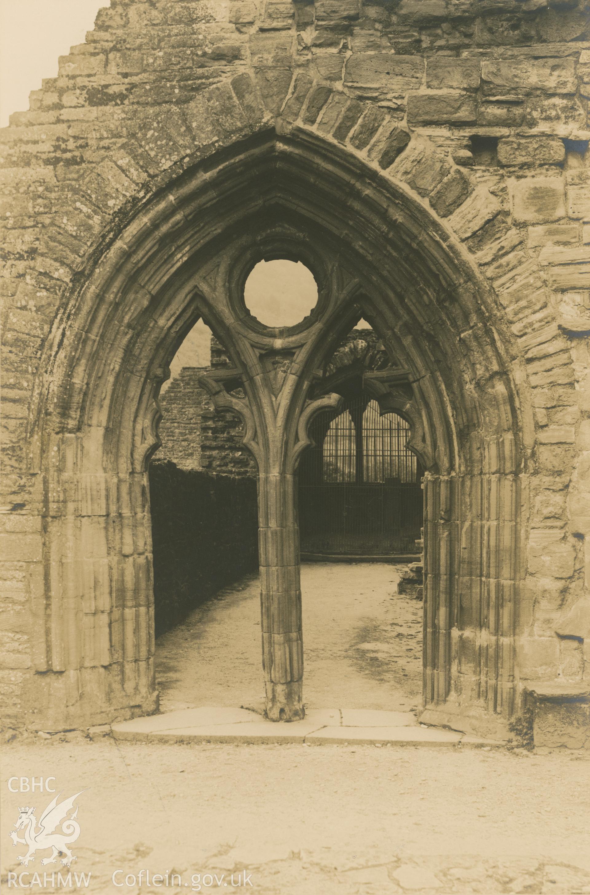 Digital copy of a view of the sacristry doorway to the cloisters at Tintern Abbey.