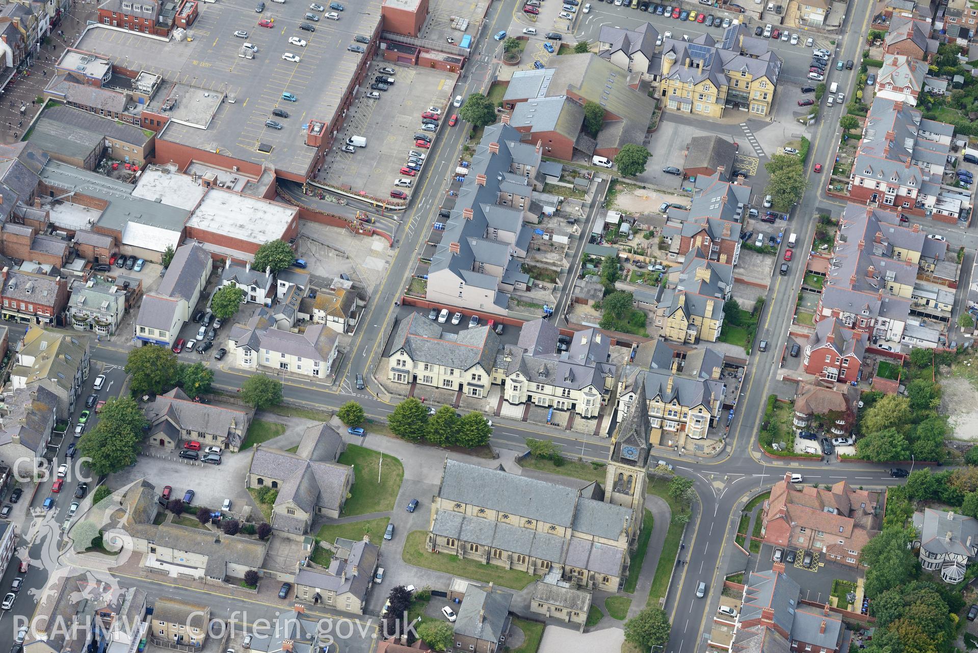 The parish church of St. Thomas, Rhyl. Oblique aerial photograph taken during the Royal Commission's programme of archaeological aerial reconnaissance by Toby Driver on 11th September 2015.