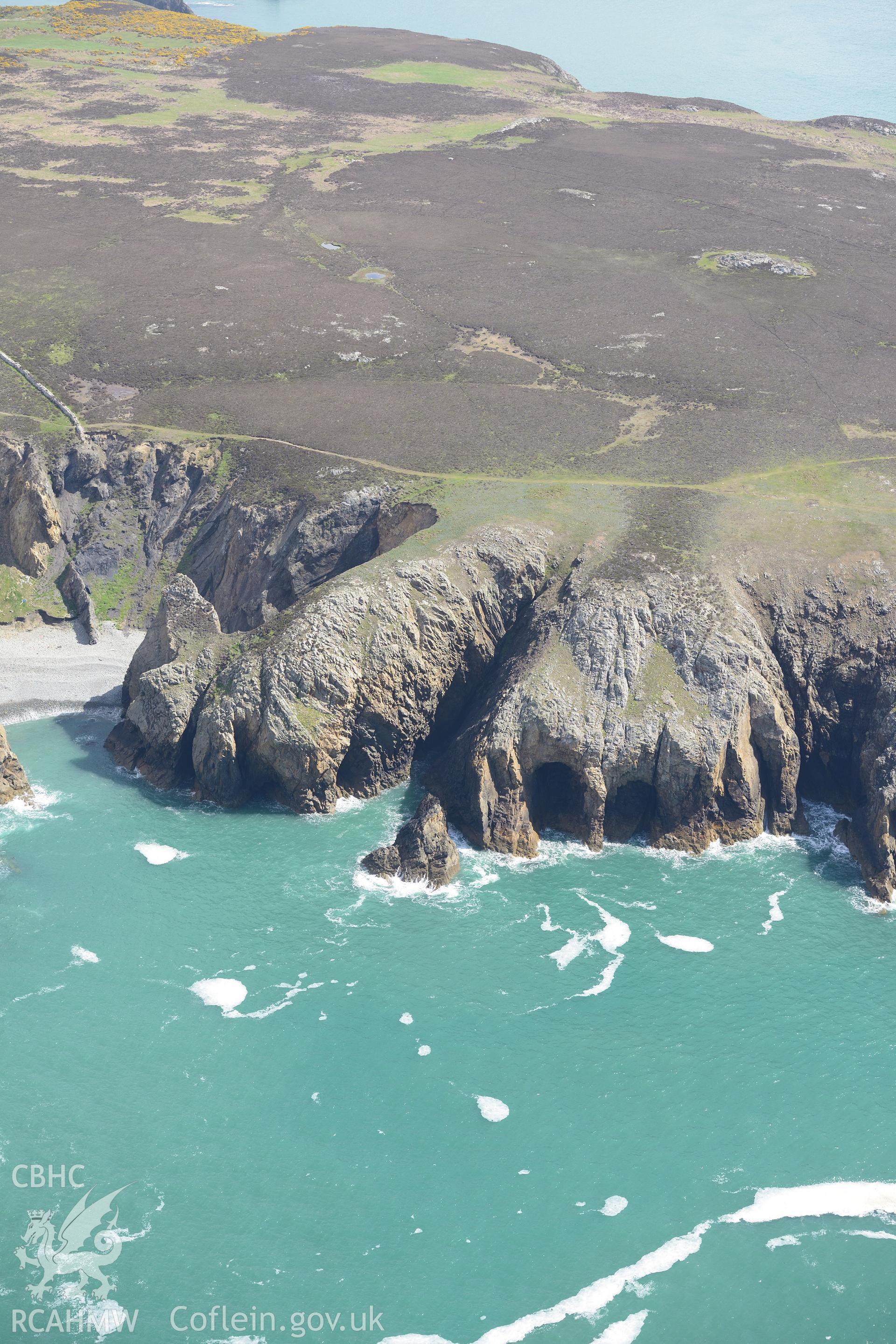 Porth Lleuog and Ogof Genau on Ramsey Island, off the coast near St Davids. Oblique aerial photograph taken during the Royal Commission's programme of archaeological aerial reconnaissance by Toby Driver on 13th May 2015.
