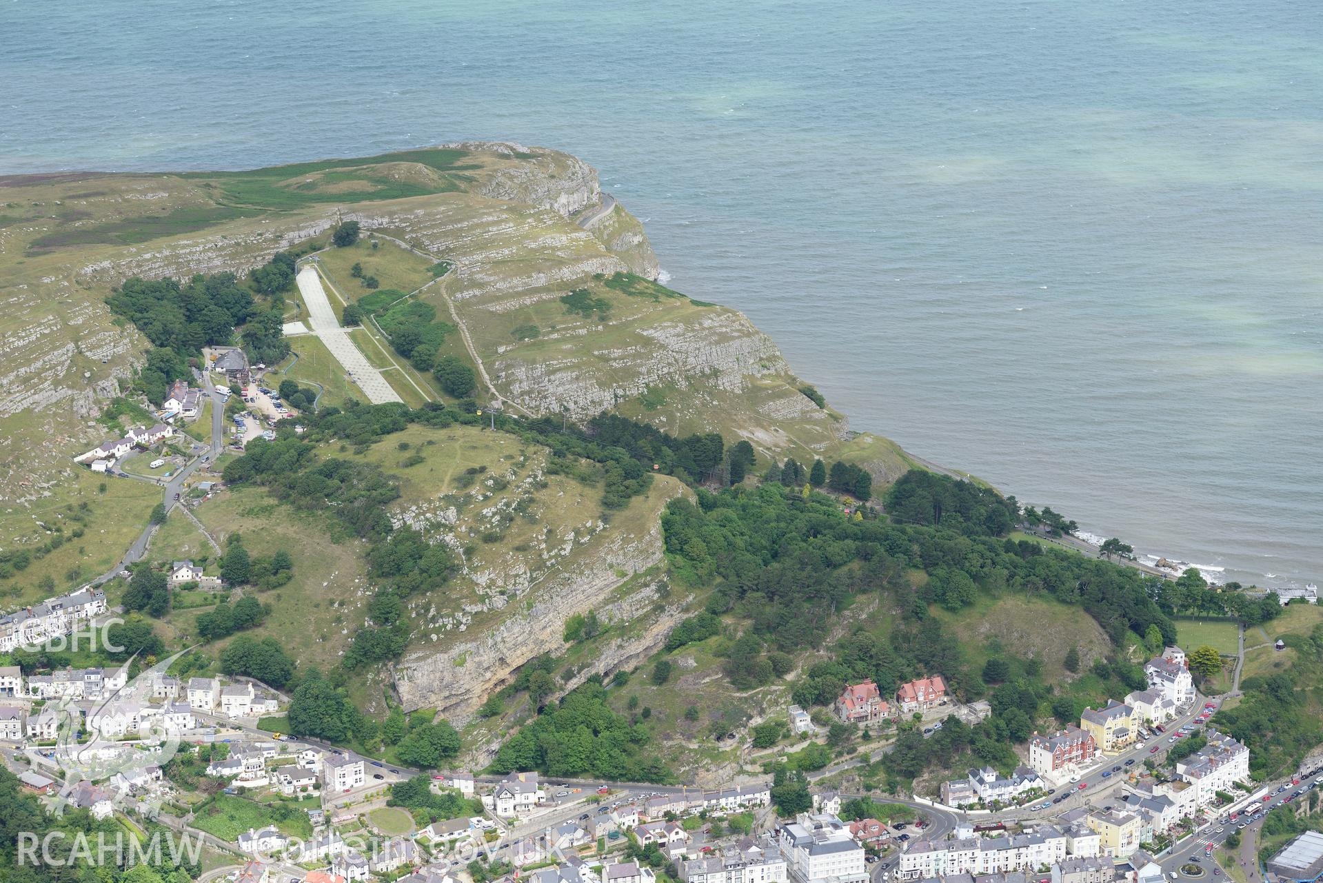 Pen-y-Dinas Hillfort, Belmont Hotel and Grand Hotel, Llandudno. Oblique aerial photograph taken during the Royal Commission's programme of archaeological aerial reconnaissance by Toby Driver on 30th July 2015.