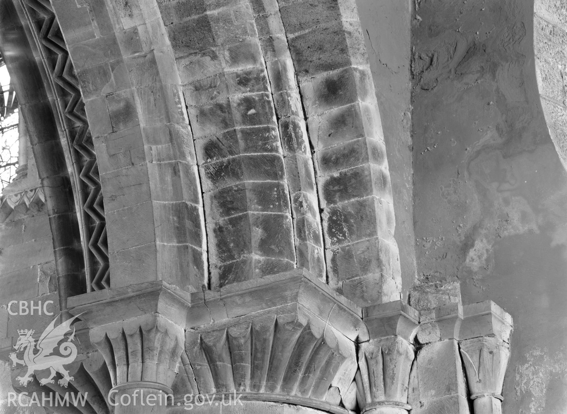 Digital copy of a black and white acetate negative showing detail view of capital at St. David's Cathedral, taken by E.W. Lovegrove, July 1936.