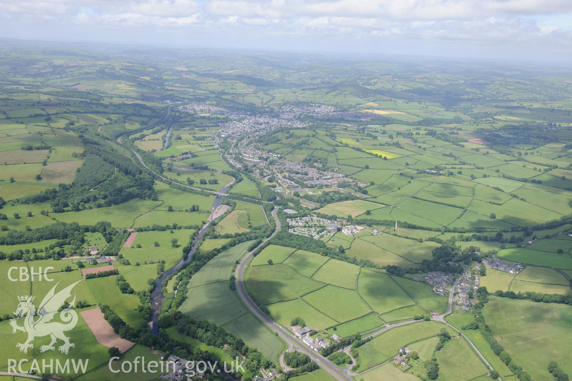 Cefn-Brynich Roman Fort, with the A40 bridge over the river Usk and the town of Brecon beyond. Oblique aerial photograph taken during the Royal Commission's programme of archaeological aerial reconnaissance by Toby Driver on 29th June 2015.