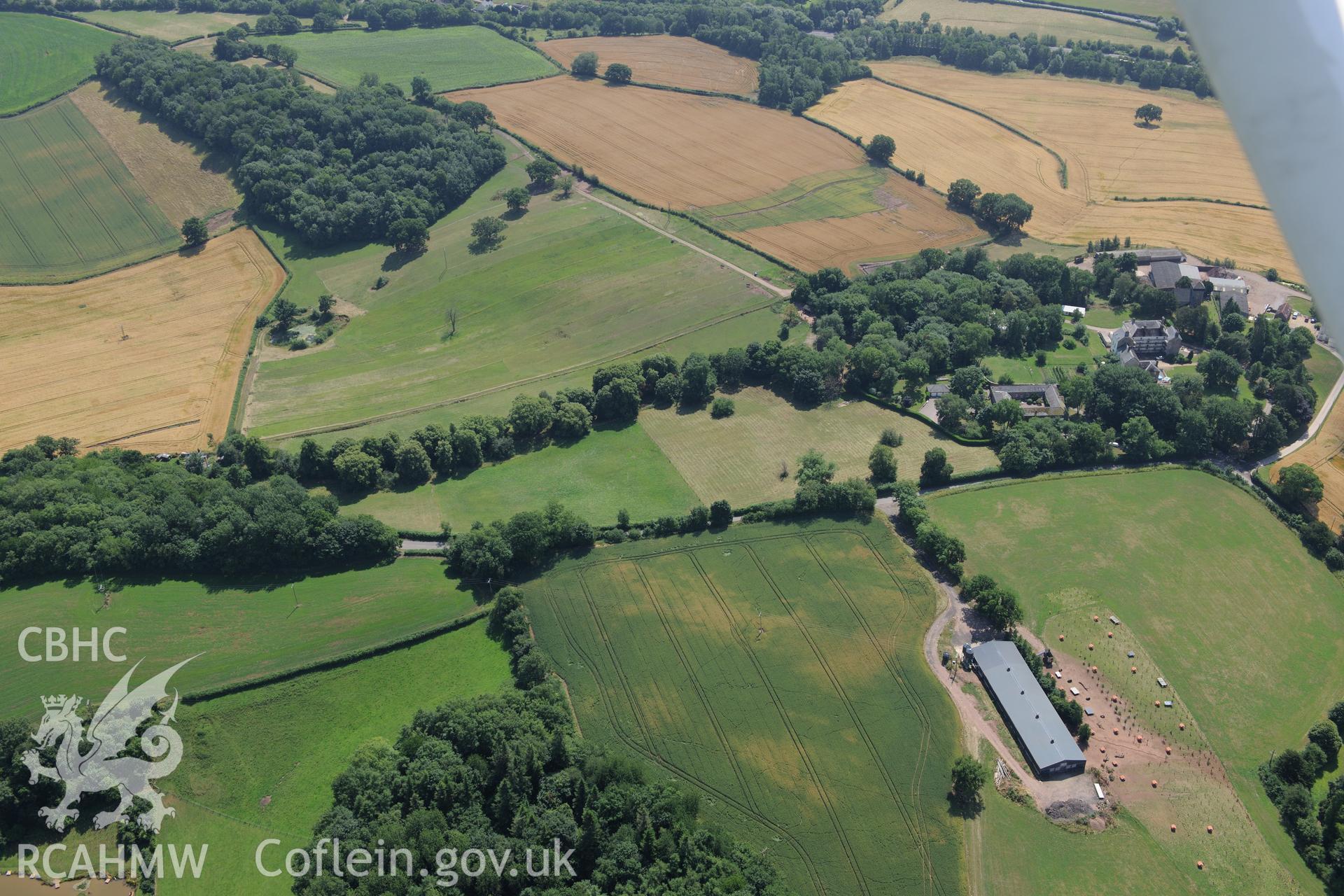 Talocher Farm Roman Fort, Wonastow Court and Wonastow Court garden, south west of Monmouth. Oblique aerial photograph taken during the Royal Commission?s programme of archaeological aerial reconnaissance by Toby Driver on 1st August 2013.