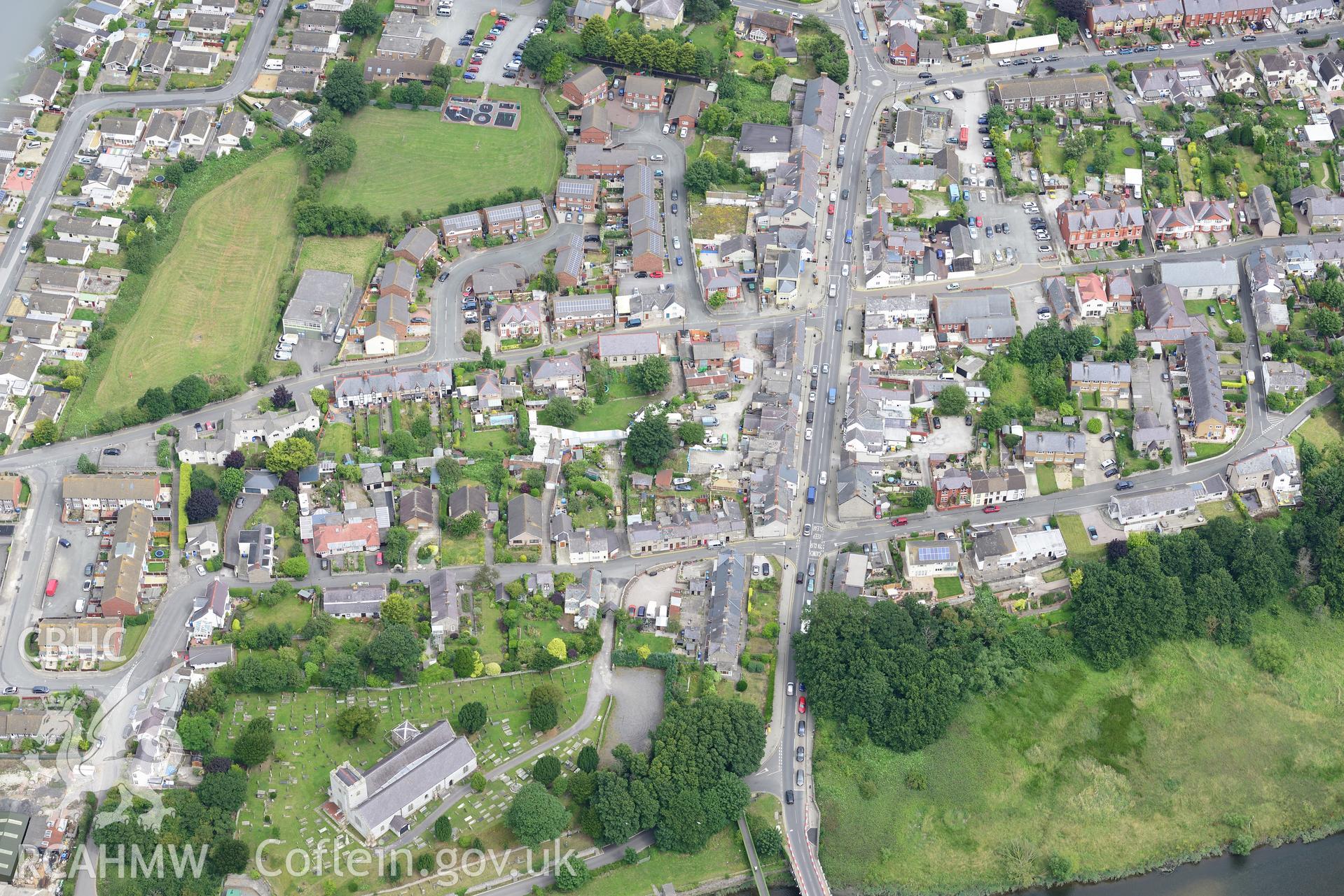 Edwardian town defences, St. Mary's Church, Ebenezer chapel and Tabernacle chapel, Rhuddlan. Oblique aerial photograph taken during the Royal Commission's programme of archaeological aerial reconnaissance by Toby Driver on 30th July 2015.