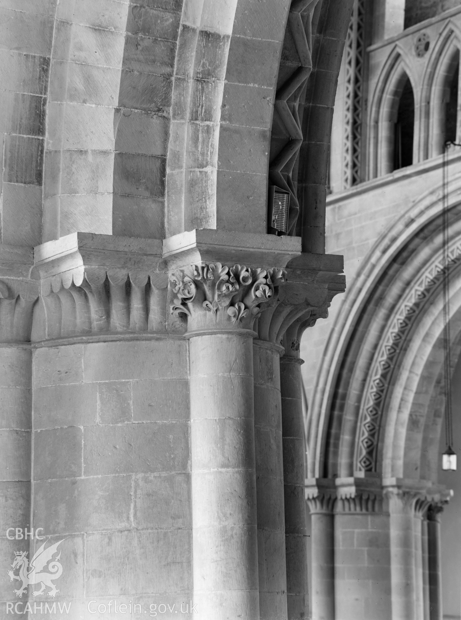 Digital copy of a black and white nitrate negative showing view of capital and arch at St. David's Cathedral, taken by E.W. Lovegrove, July 1936.