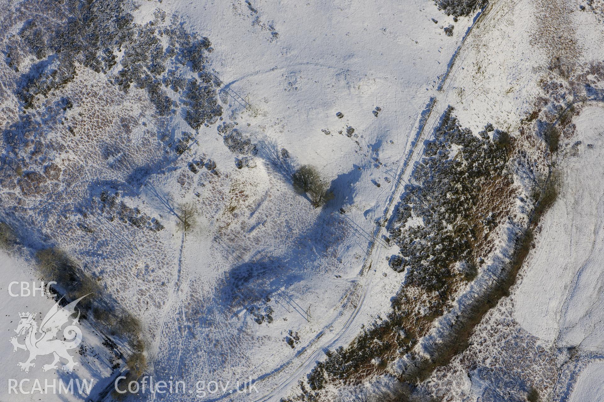 House platforms west of Gaer Fawr, north east of Builth Wells. Oblique aerial photograph taken during the Royal Commission?s programme of archaeological aerial reconnaissance by Toby Driver on 15th January 2013.