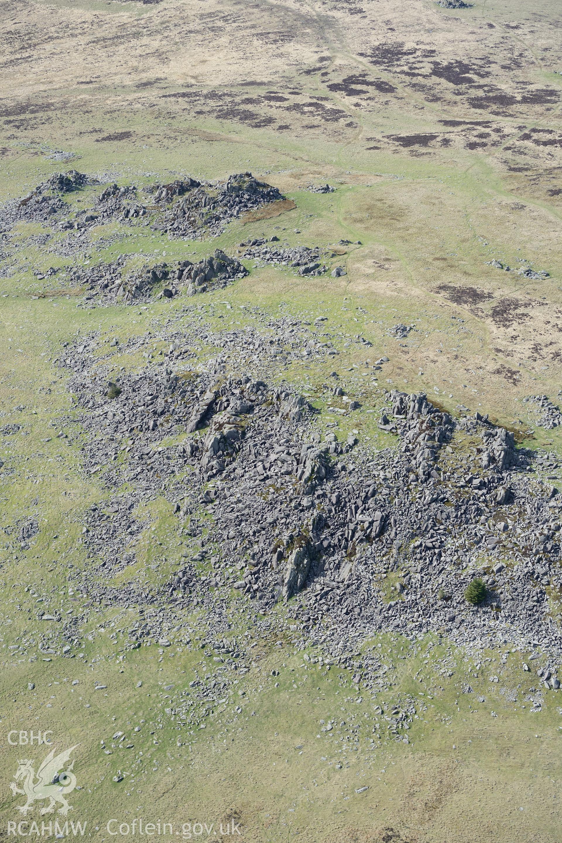 Carn Menyn Cairn. Oblique aerial photograph taken during the Royal Commission's programme of archaeological aerial reconnaissance by Toby Driver on 15th April 2015.