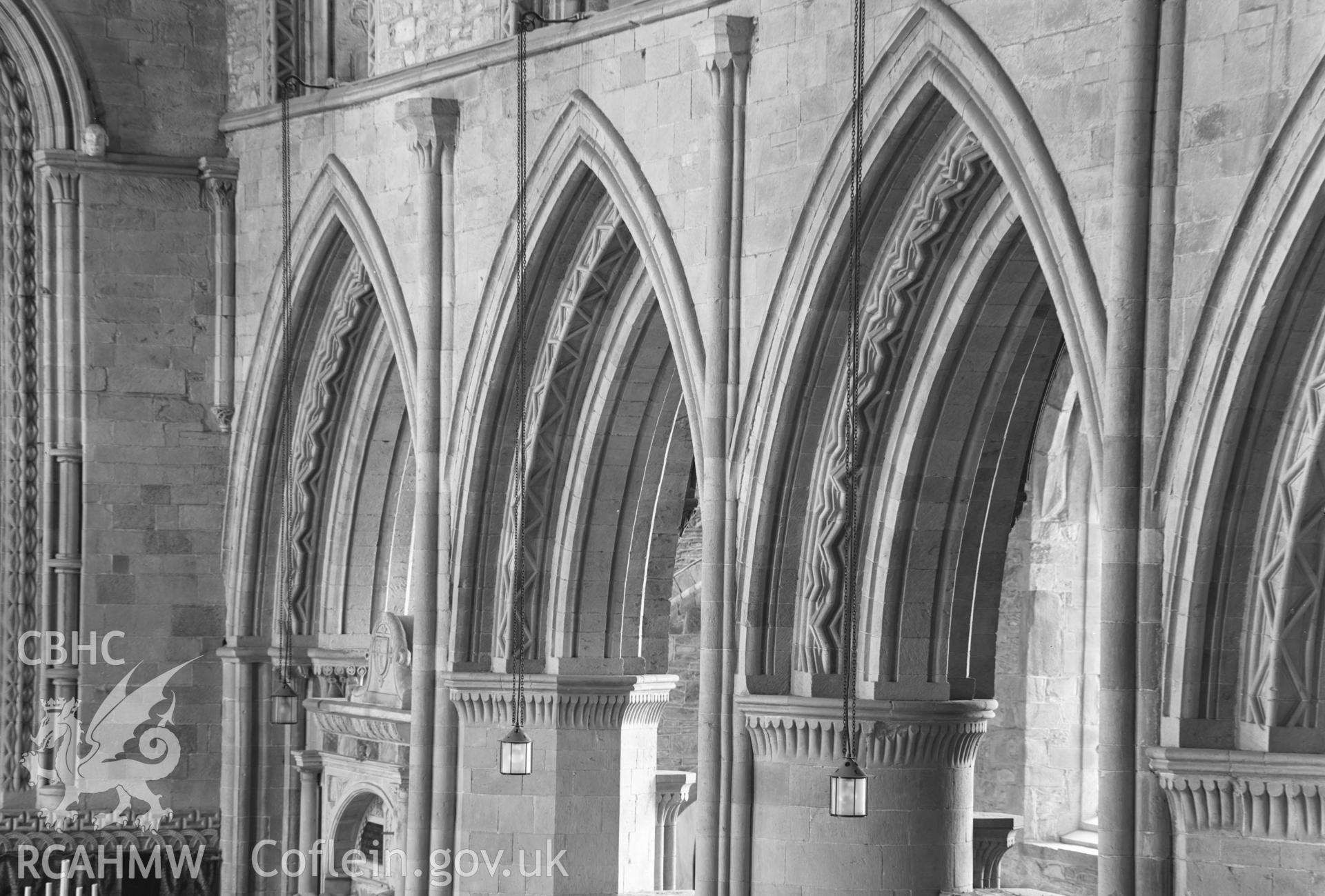 Digital copy of a black and white acetate negative showing interior arches at St. David's Cathedral, taken by E.W. Lovegrove, July 1936