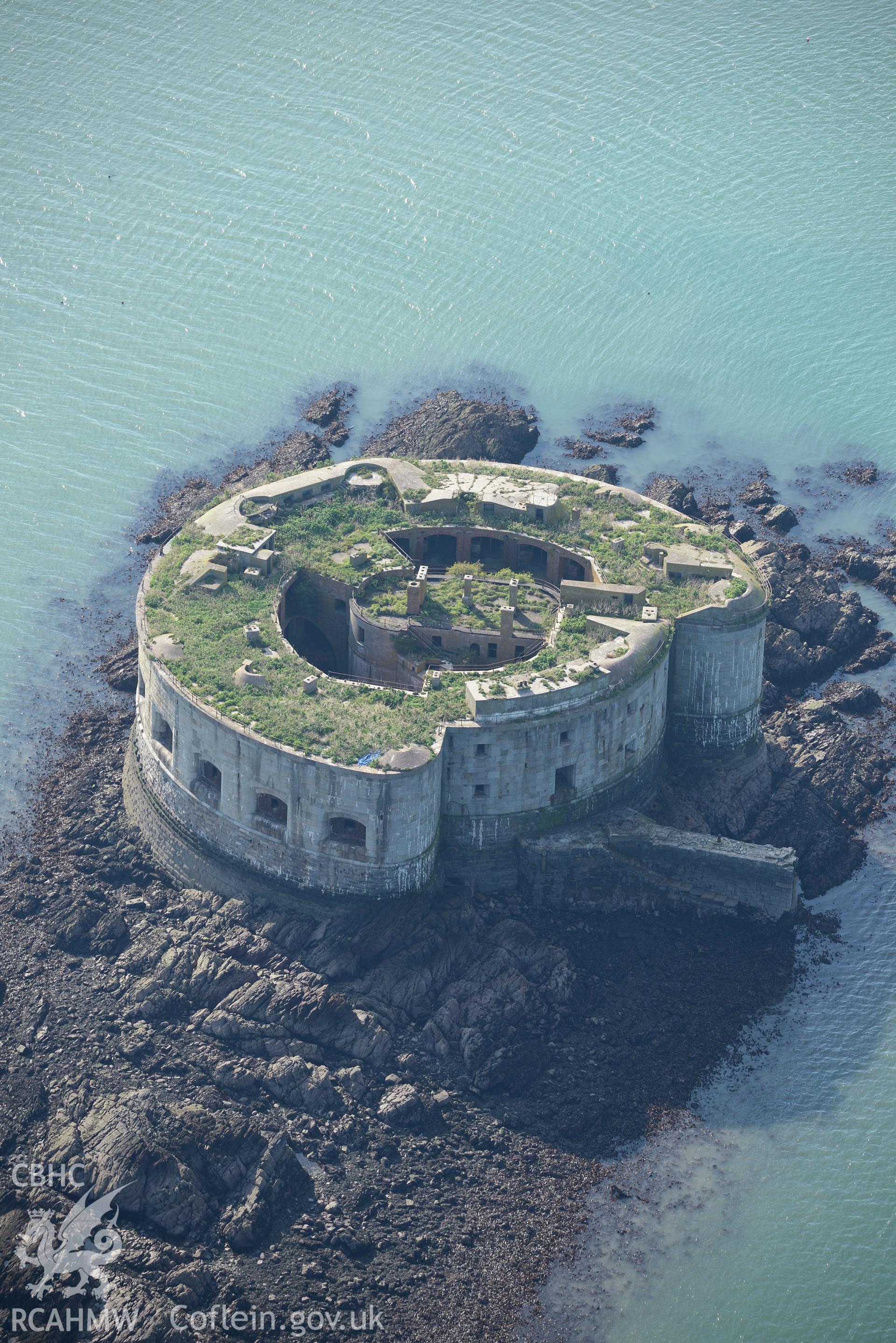 Stack Rock Fort, Milford Haven. Oblique aerial photograph taken during the Royal Commission's programme of archaeological aerial reconnaissance by Toby Driver on 30th September 2015.