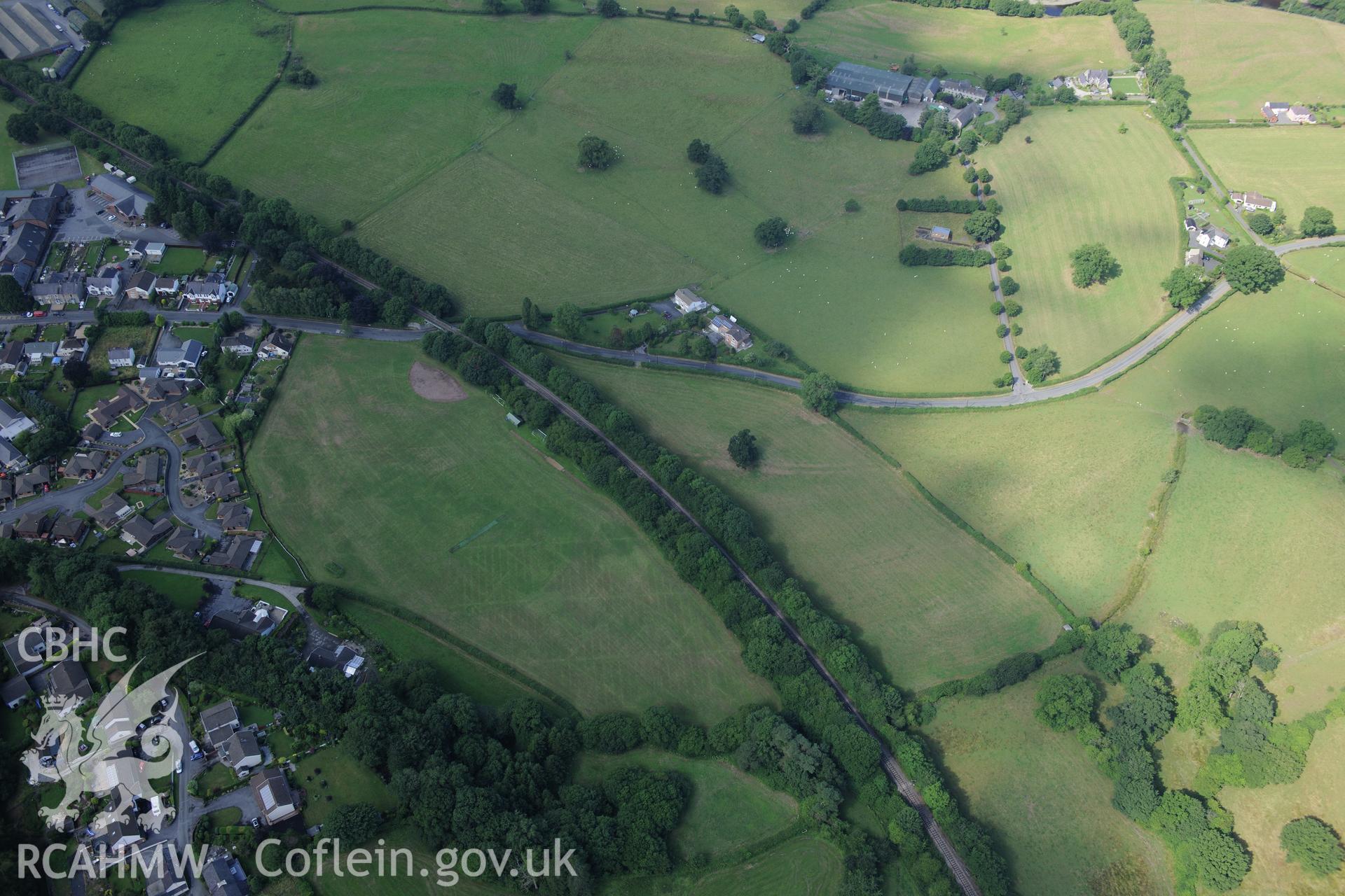 Alabum Roman fort on the north eastern outskirts of Llandovery. Oblique aerial photograph taken during the Royal Commission?s programme of archaeological aerial reconnaissance by Toby Driver on 1st August 2013.