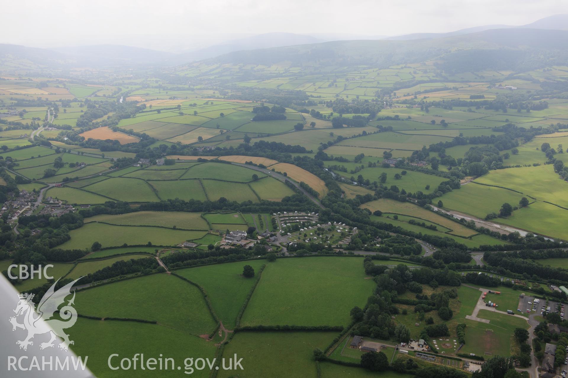 Cefn-brynich Roman fort, distant view from north-west, taken by RCAHMW 1st August 2013.