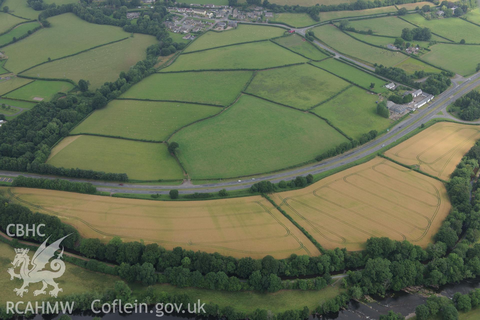 Cefn-brynich Roman fort, general view of cropmarks from south-west, taken by RCAHMW 1st August 2013.