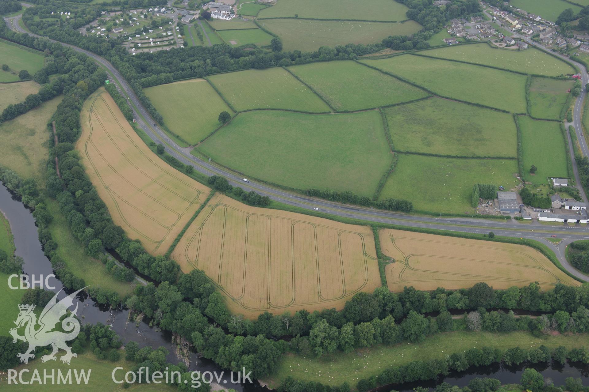 Cefn-brynich Roman fort, general view of cropmarks from south, taken by RCAHMW 1st August 2013.