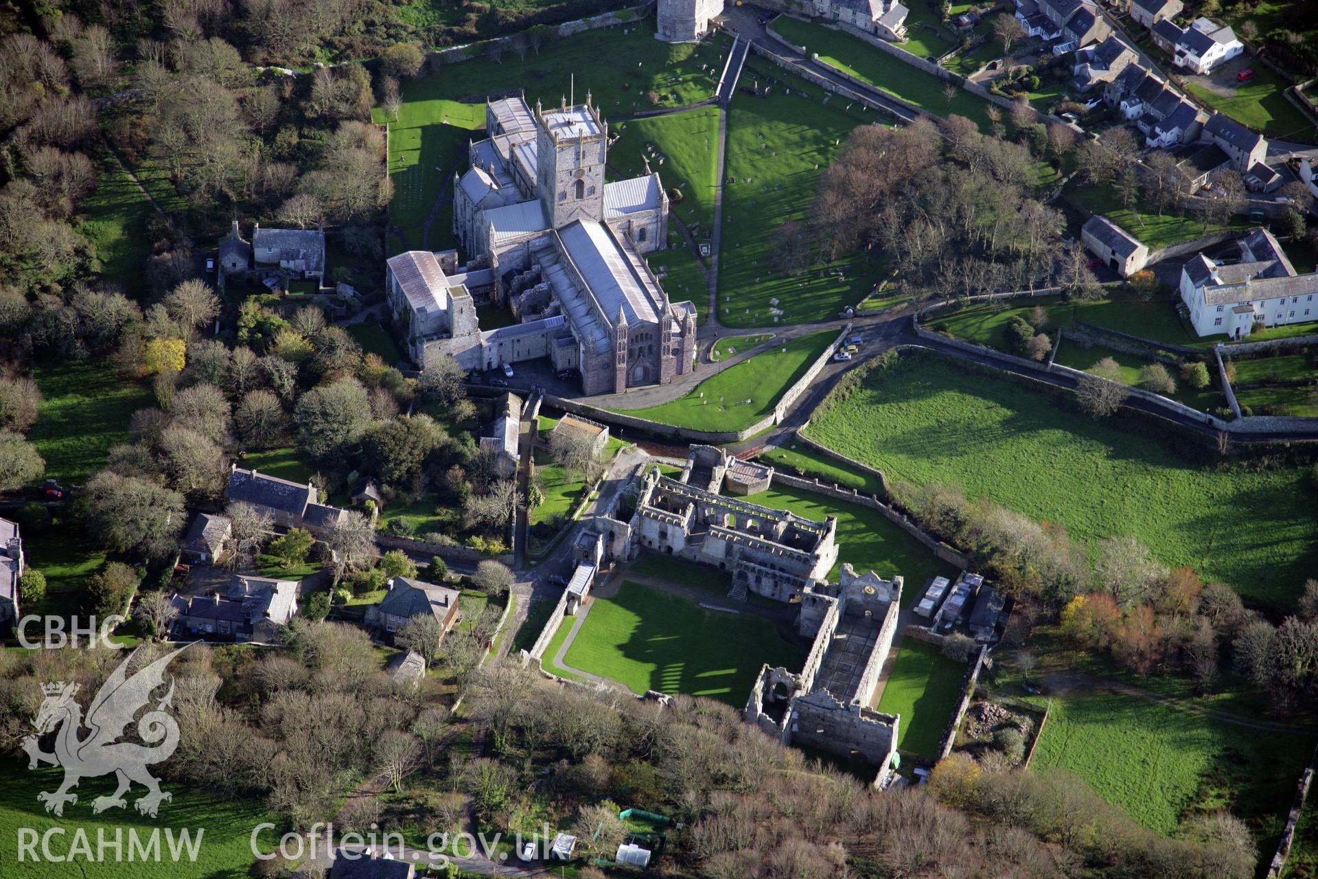 RCAHMW colour oblique photograph of St David's Cathedral and Bishops Palace, viewed from the north. Taken by O. Davies & T. Driver on 22/11/2013.