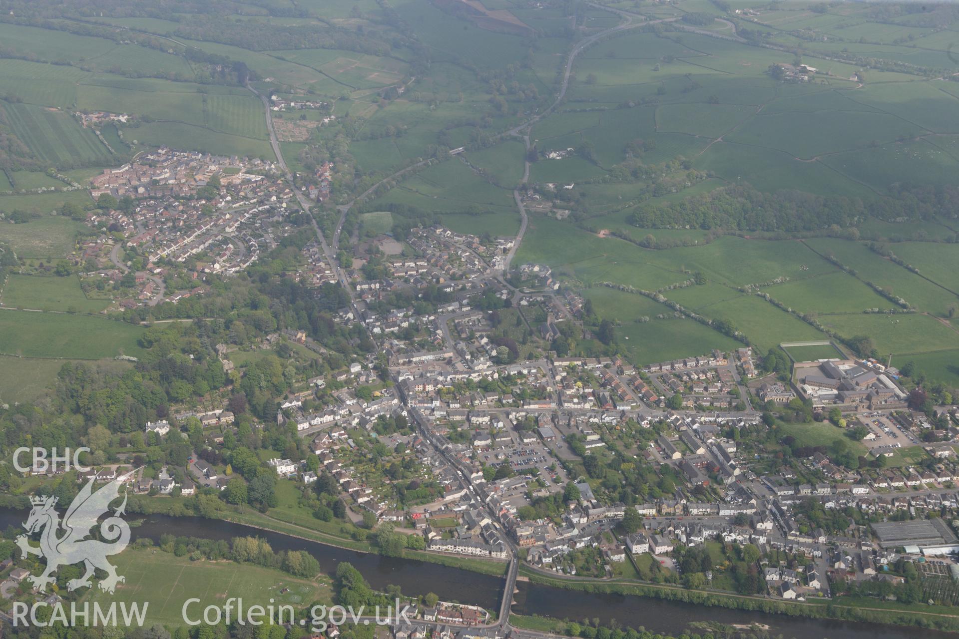 RCAHMW colour oblique photograph of Usk, townscape from west. Taken by Toby Driver on 26/04/2011.