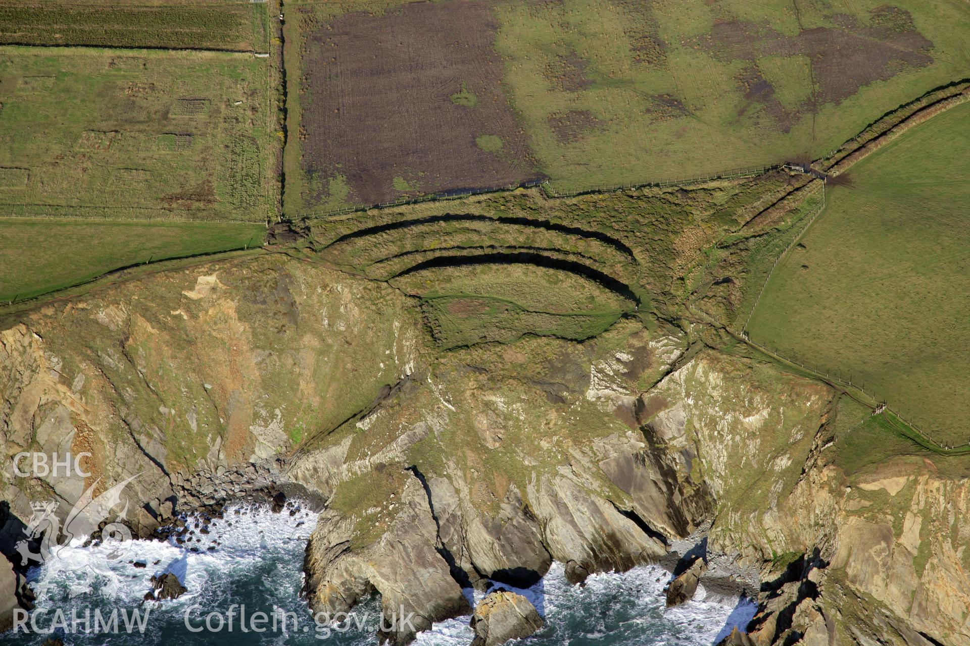 RCAHMW colour oblique photograph of Marloes Sound Rath promontory fort, viewed from the south. Taken by O. Davies & T. Driver on 22/11/2013.