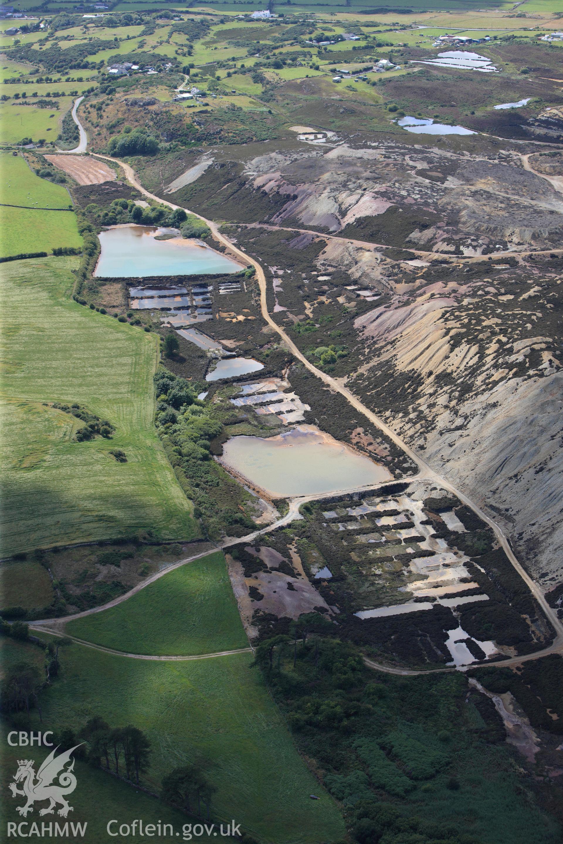 RCAHMW colour oblique photograph of Parys Mountain Copper Mines, Amlwch, ponds on south side. Taken by Toby Driver on 20/07/2011.