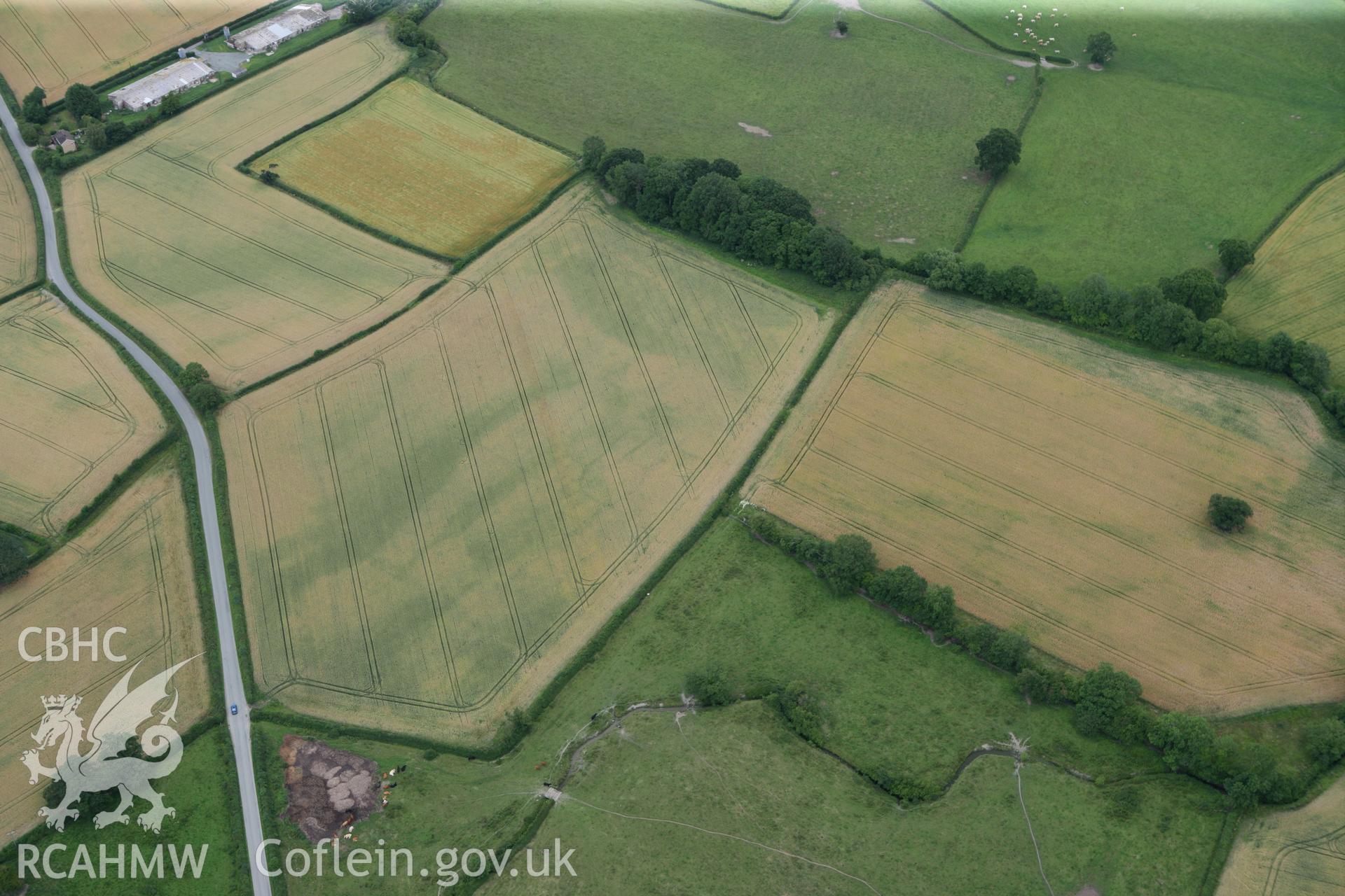 RCAHMW colour oblique photograph of Penthryn Fechan cropmarks. Taken by Toby Driver on 20/07/2011.