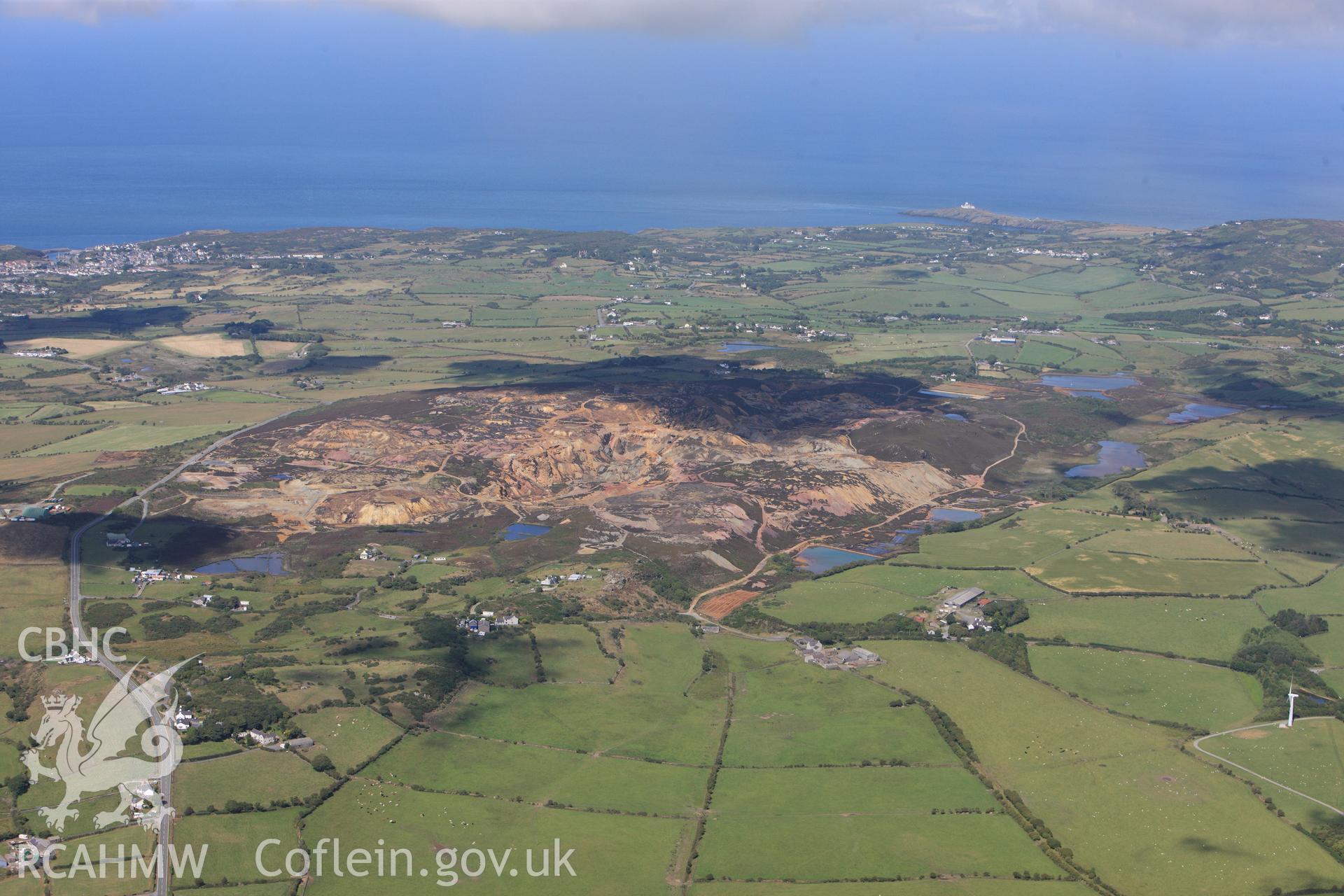 RCAHMW colour oblique photograph of Parys Mountain Copper Mines, Amlwch, general view from south. Taken by Toby Driver on 20/07/2011.