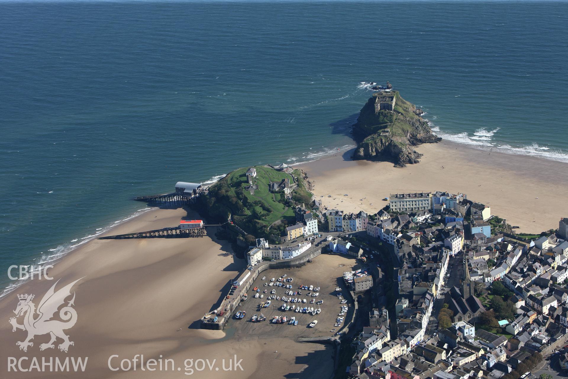 RCAHMW colour oblique photograph of Tenby harbour and Tenby Castle, viewed from the north-west. Taken by Toby Driver and Oliver Davies on 28/09/2011.