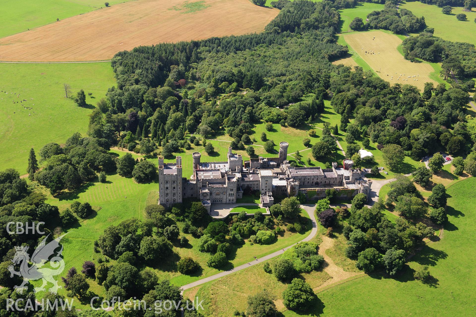 RCAHMW colour oblique photograph of Penrhyn Castle, viewed from the east. Taken by Toby Driver on 10/08/2012.