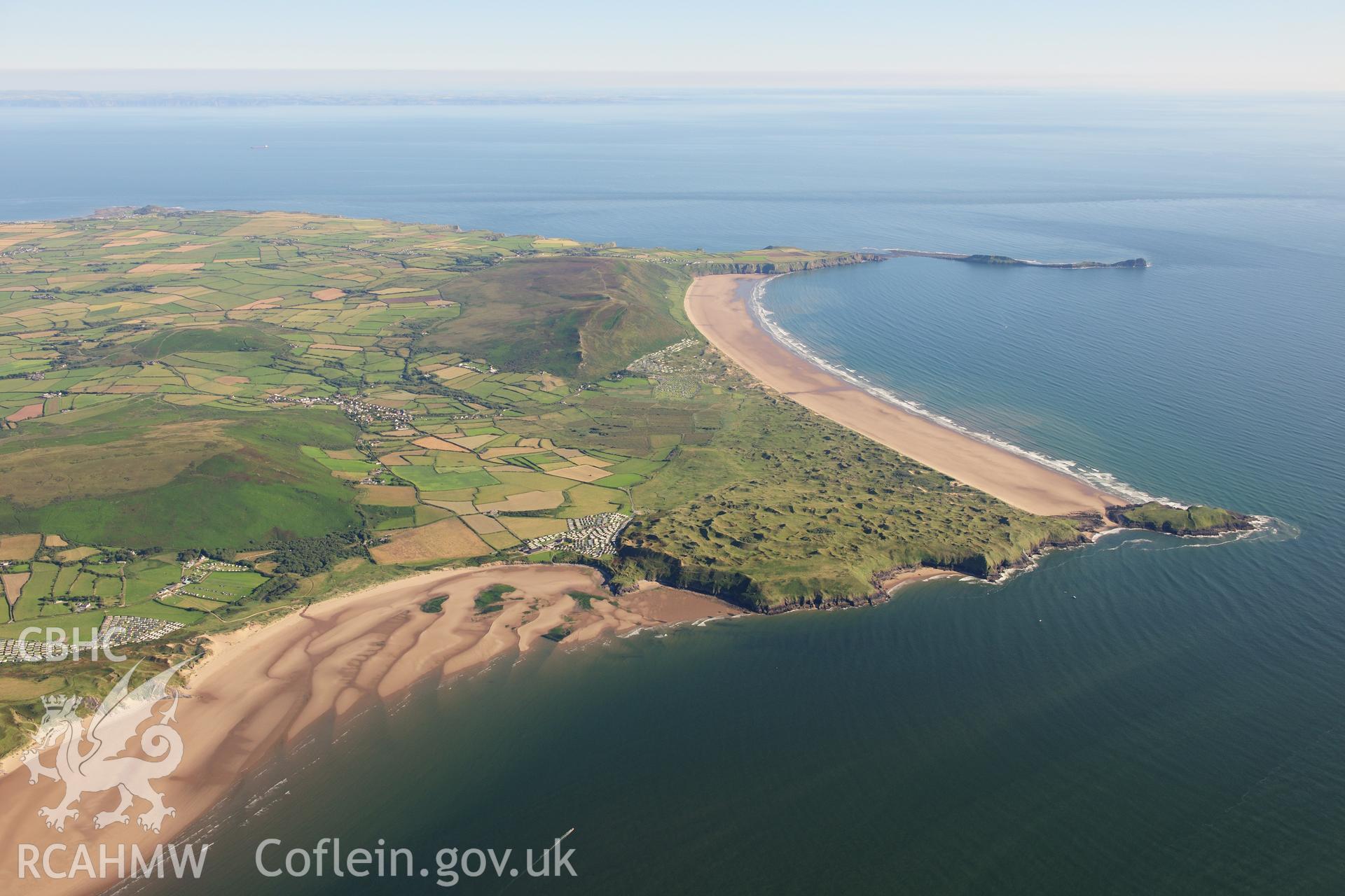 RCAHMW colour oblique photograph of West Gower, high landscape view over Rhossili Bay. Taken by Toby Driver on 24/07/2012.