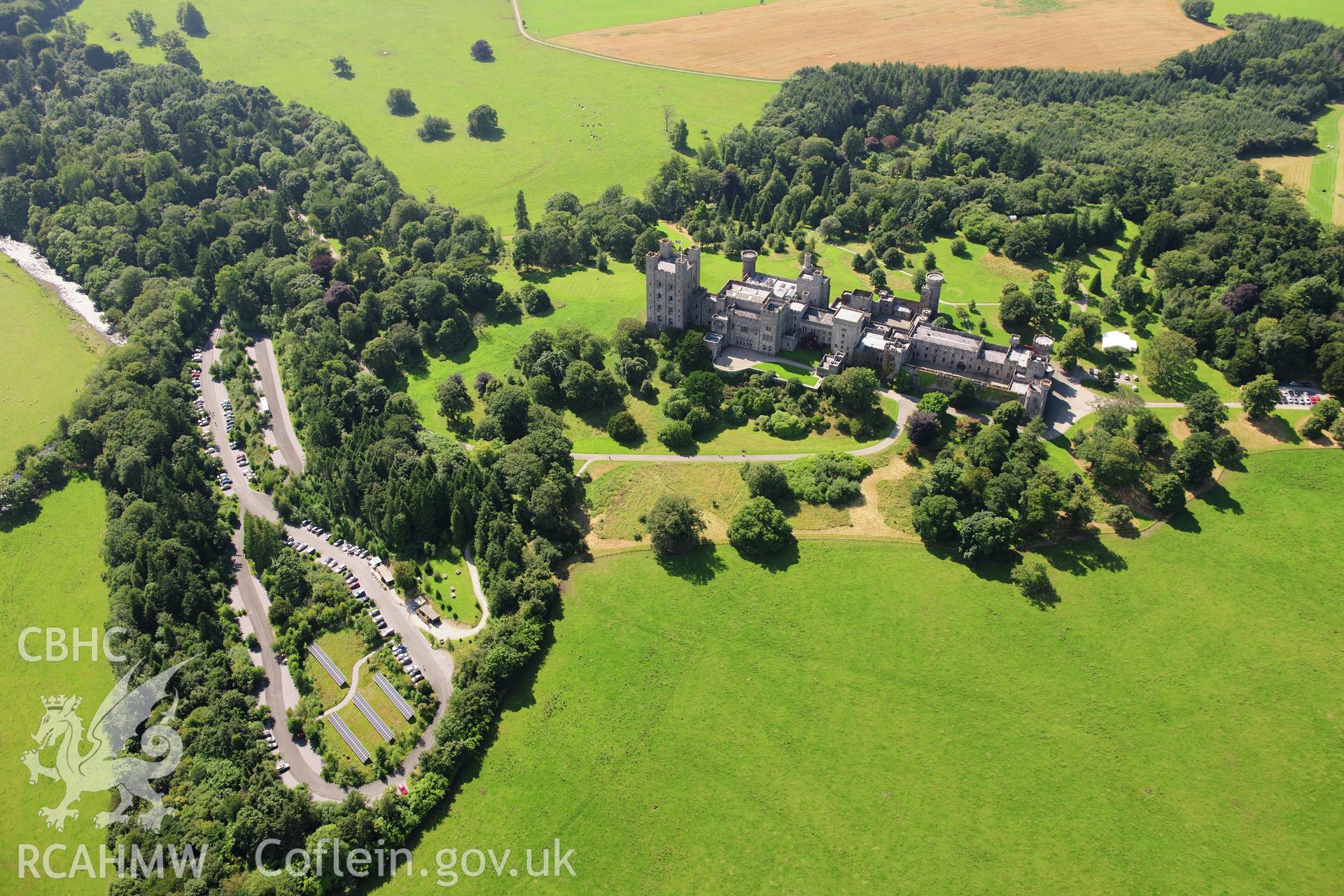 RCAHMW colour oblique photograph of Penrhyn Castle, viewed from the north-east. Taken by Toby Driver on 10/08/2012.