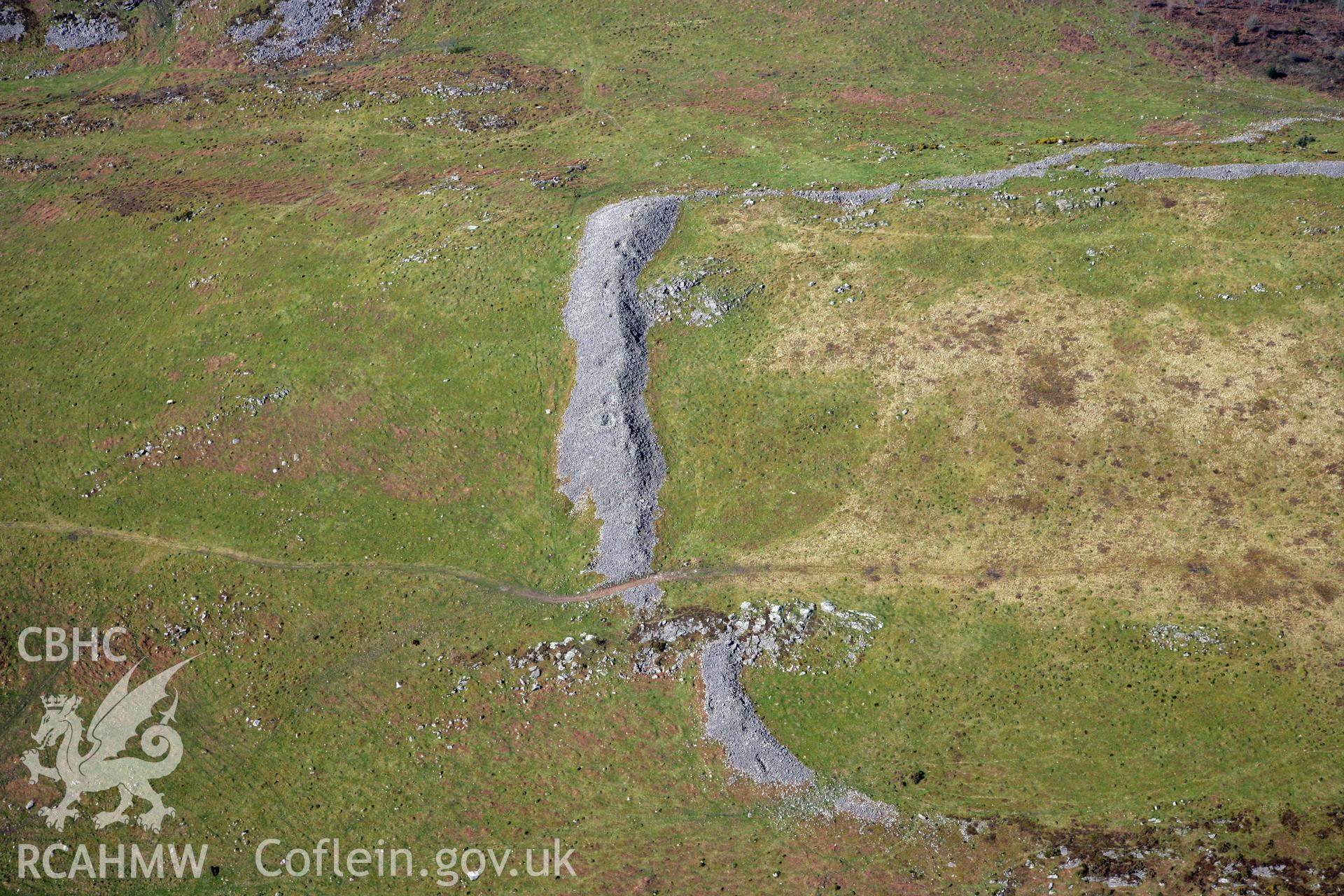RCAHMW colour oblique photograph of Y Gaer Fawr, hillfort on Carn Goch. Taken by Toby Driver and Oliver Davies on 28/03/2012.