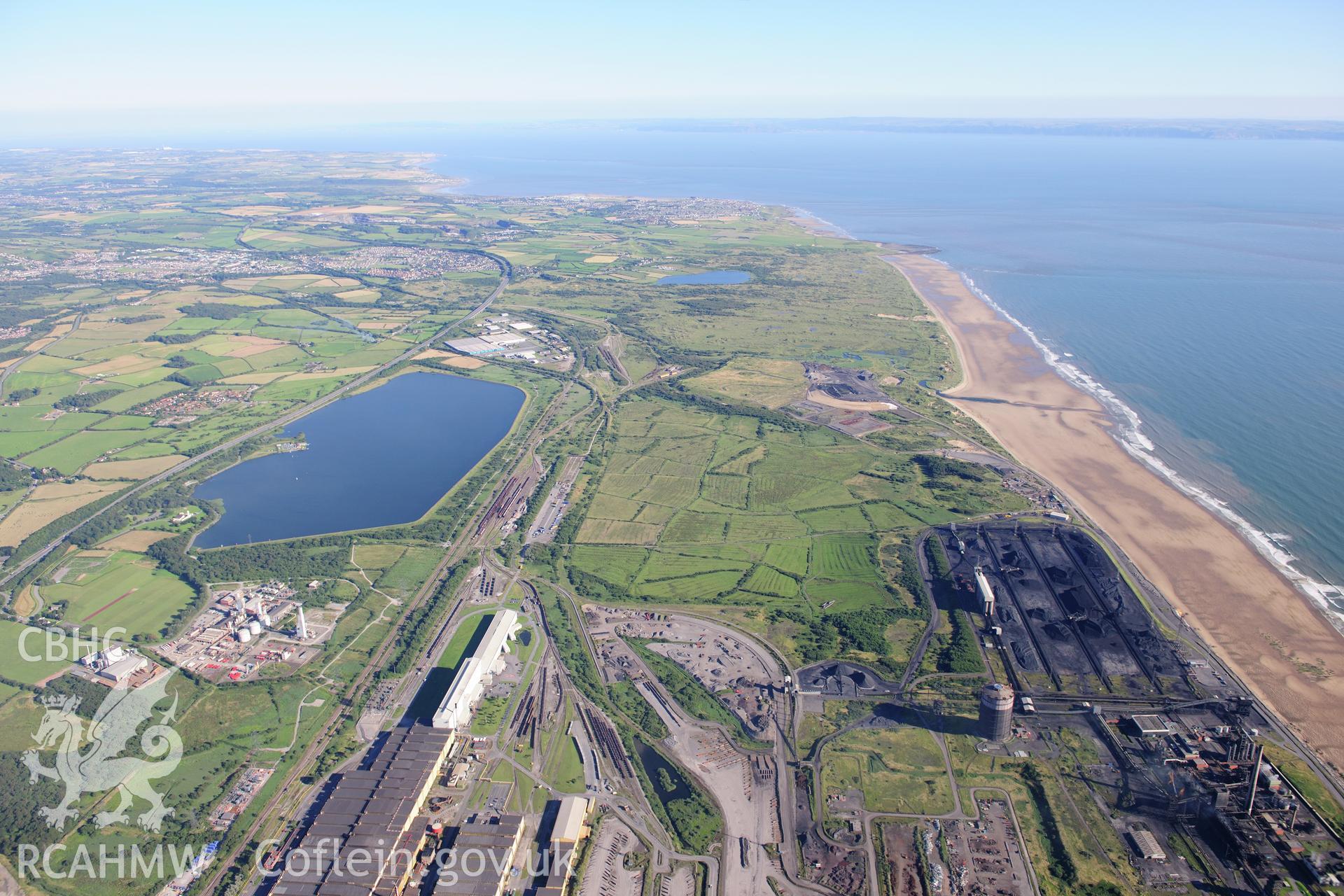 RCAHMW colour oblique photograph of Margam Steelworks, landscape looking south. Taken by Toby Driver on 24/07/2012.