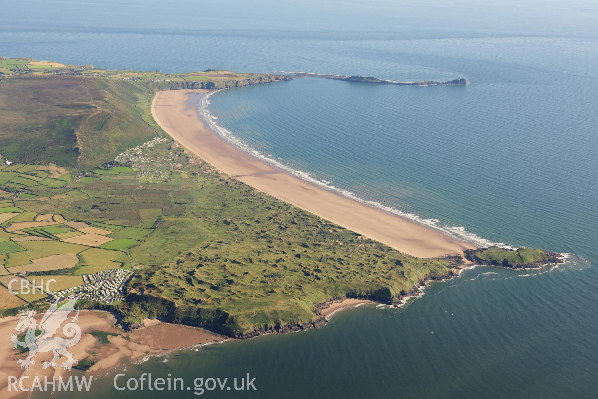 RCAHMW colour oblique photograph of West Gower, high landscape view over Rhossili Bay. Taken by Toby Driver on 24/07/2012.
