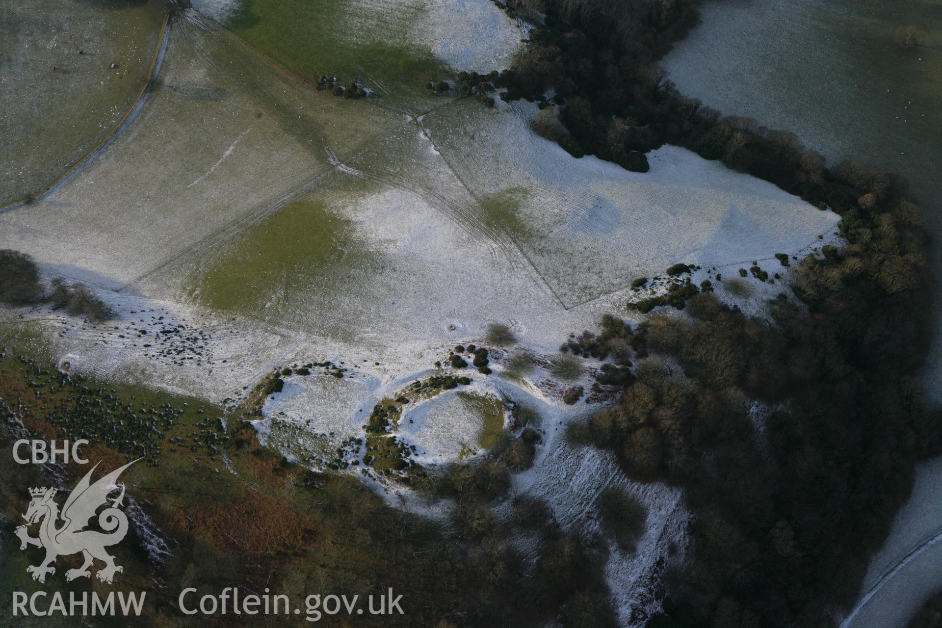 RCAHMW colour oblique photograph of Castell Tan y Castell, with snow. Taken by Toby Driver on 02/12/2010.