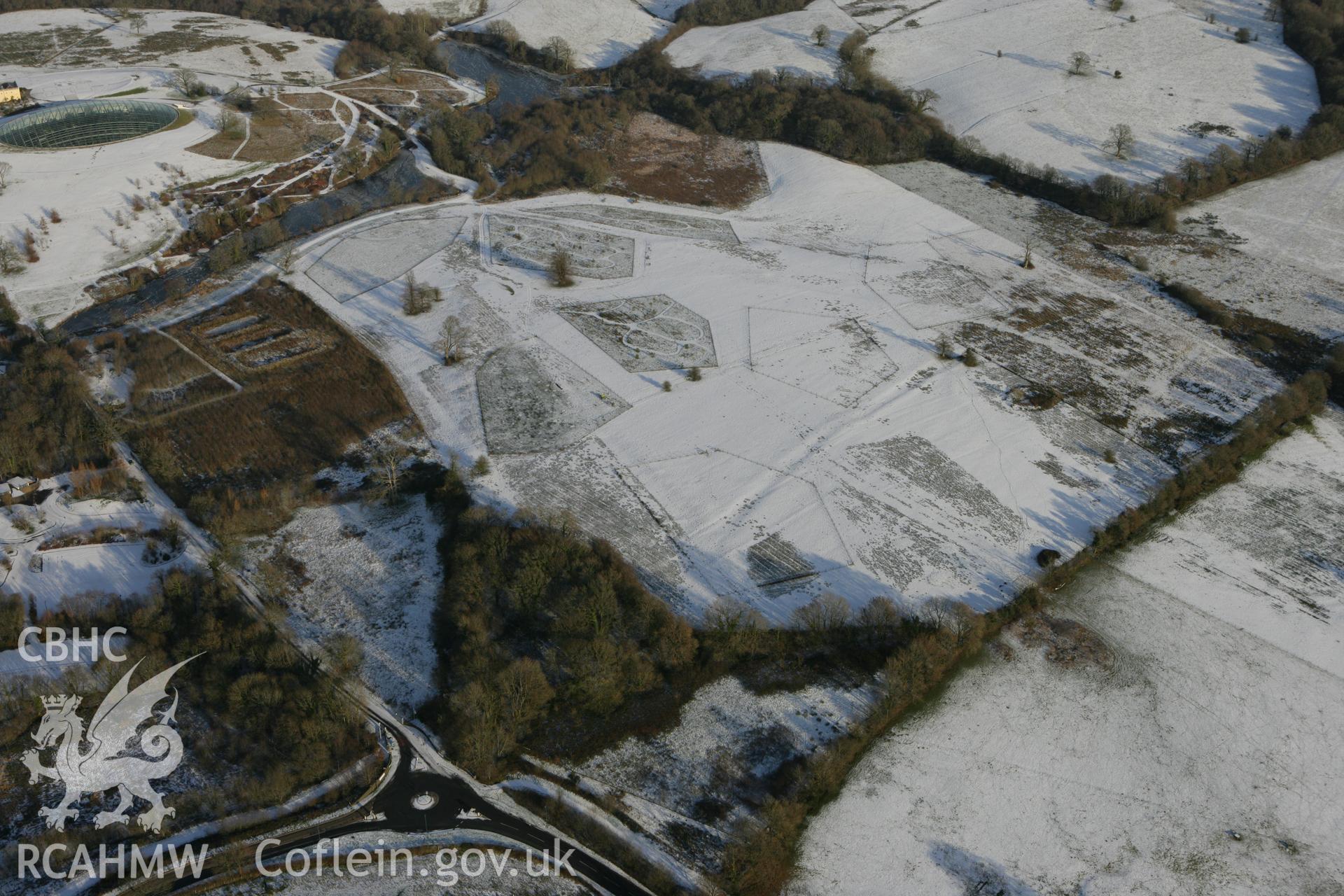 RCAHMW colour oblique photograph of the National Botanic Garden of Wales, showing planting schemes under snow. Taken by Toby Driver on 01/12/2010.