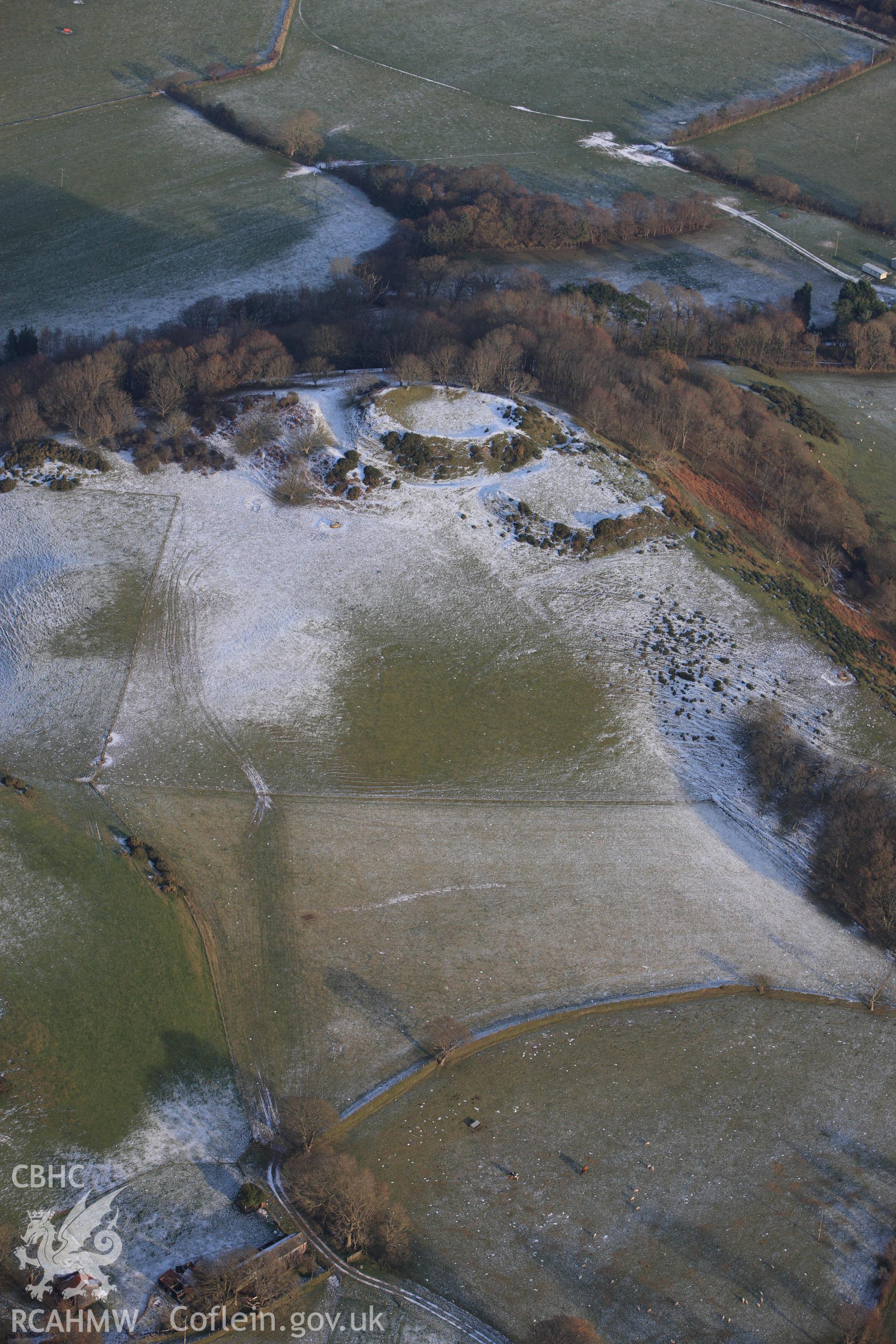 RCAHMW colour oblique photograph of Castell Tan y Castell, with snow. Taken by Toby Driver on 02/12/2010.