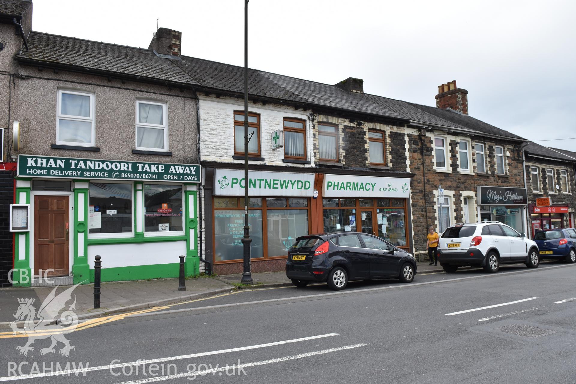 Front elevation of shops on a street in the Pontnewydd area of Cwmbran. Photographed by Susan Fielding of RCAHMW on 25 May 2021.