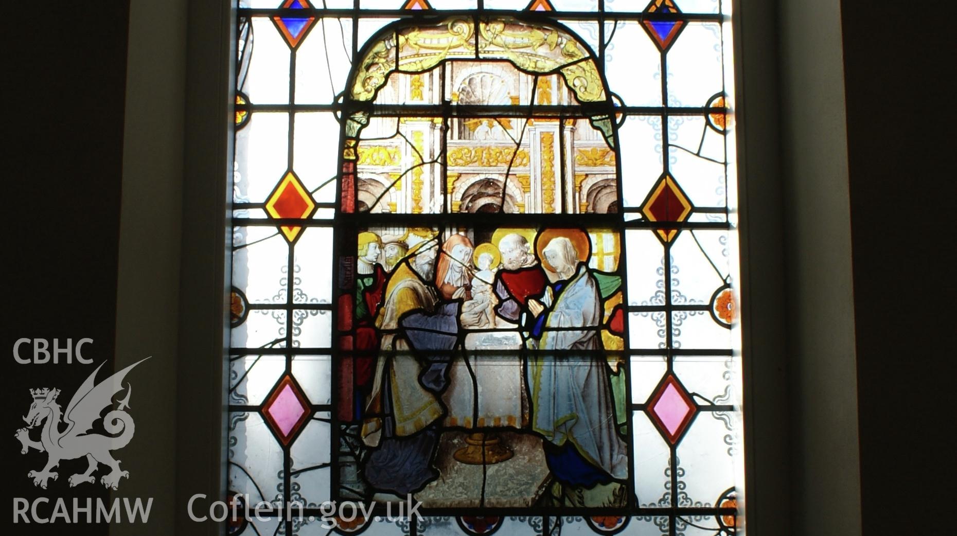 Digital colour photograph showing stained glass at St Mary and St Michael Catholic church, Llanarth.
