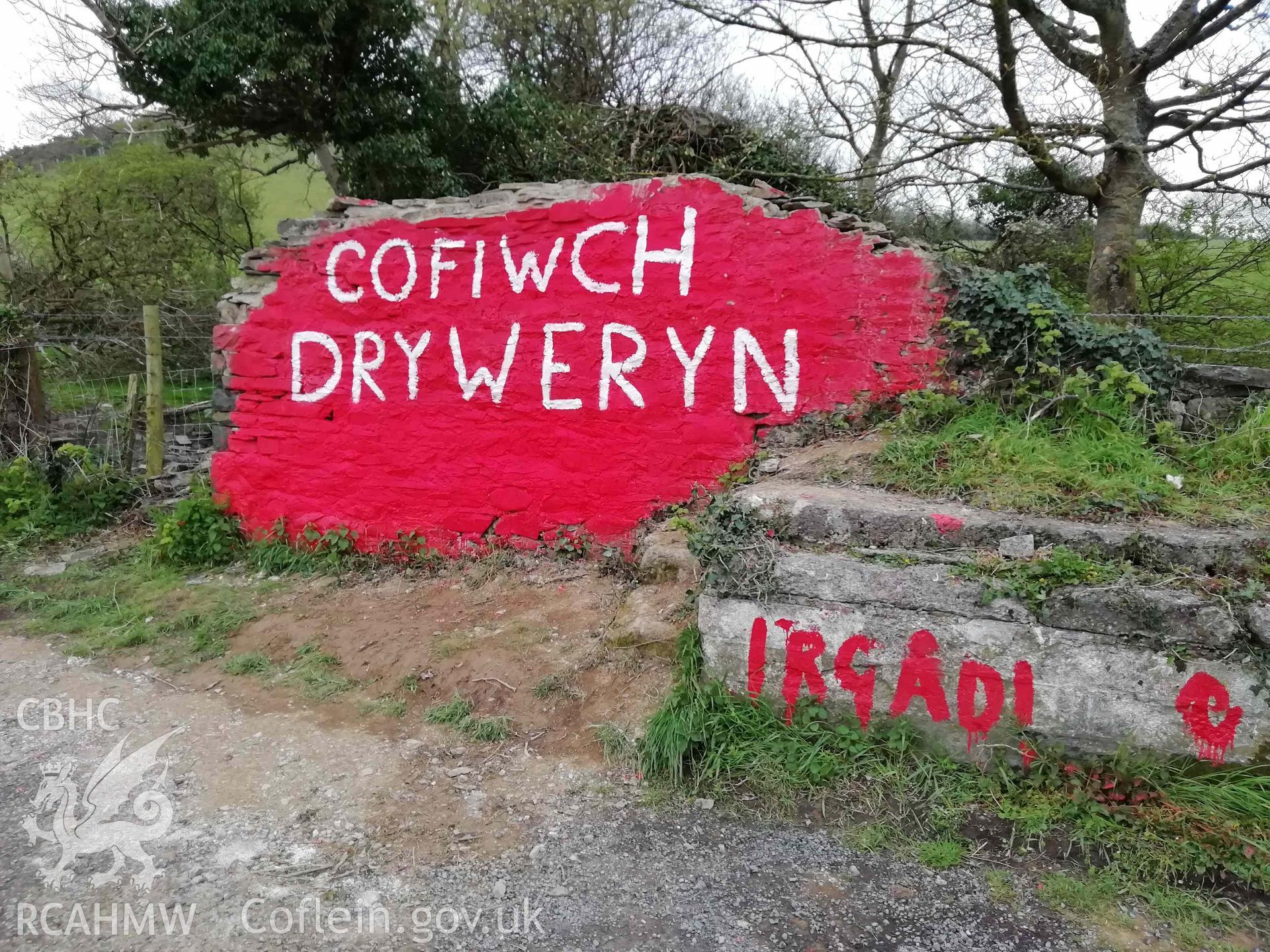 Digital colour photograph showing Cofiwch Dryweryn Wall, following repairs and repainting. Taken 15 April 2019.