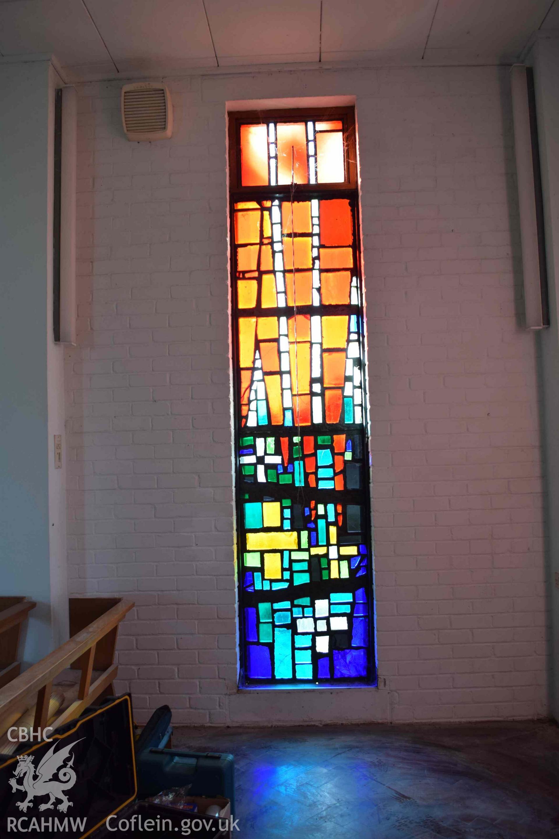 Photograph showing a Jonah Jones Dalle de Verre window (11a), at the church of The Resurrection of Our Saviour, Morfa Nefyn, taken on behalf of the Architectural Glass Centre during the removal of the windows in March 2019.