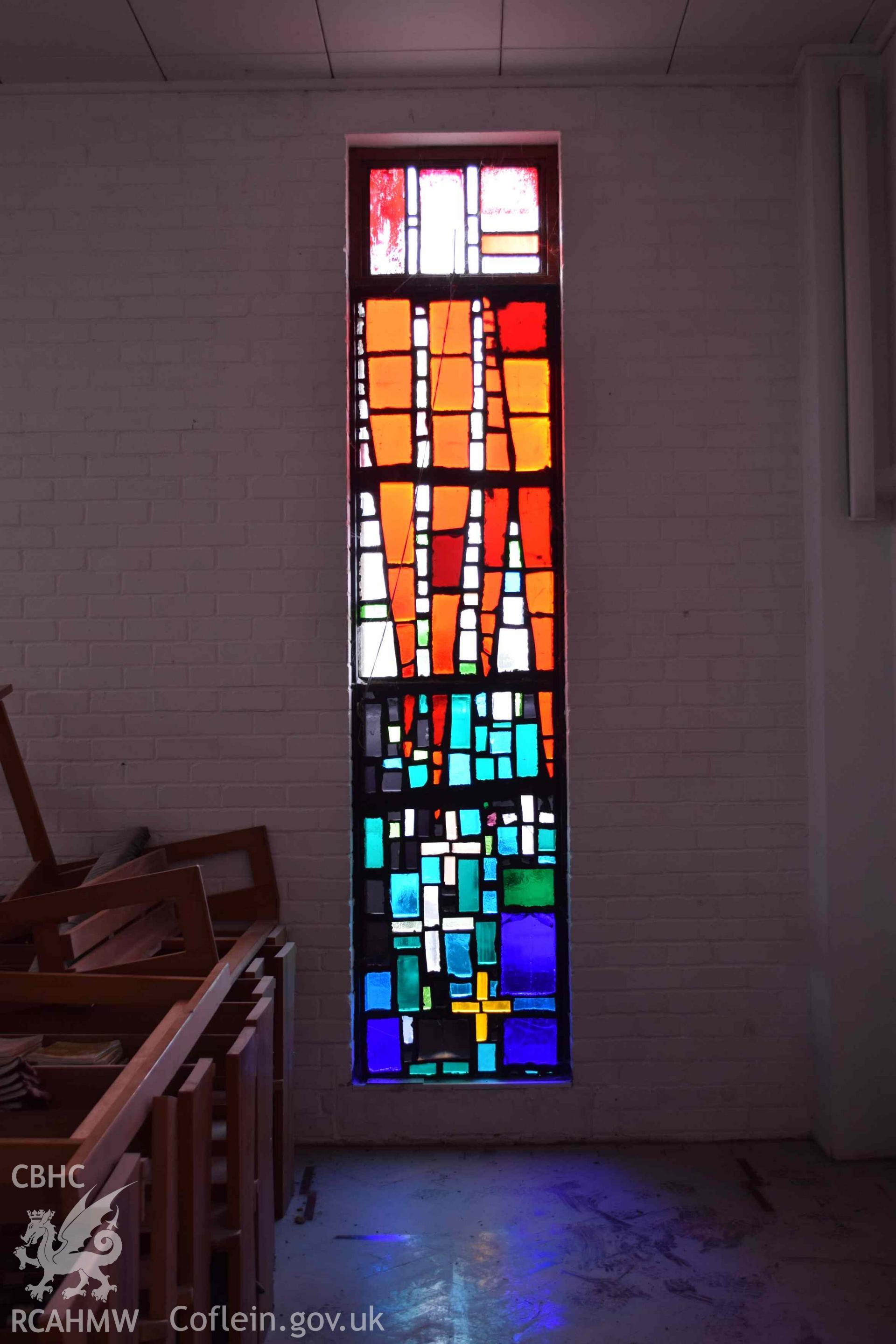 Photograph showing a Jonah Jones Dalle de Verre window (1a), at the church of The Resurrection of Our Saviour, Morfa Nefyn, taken on behalf of the Architectural Glass Centre during the removal of the windows in March 2019.