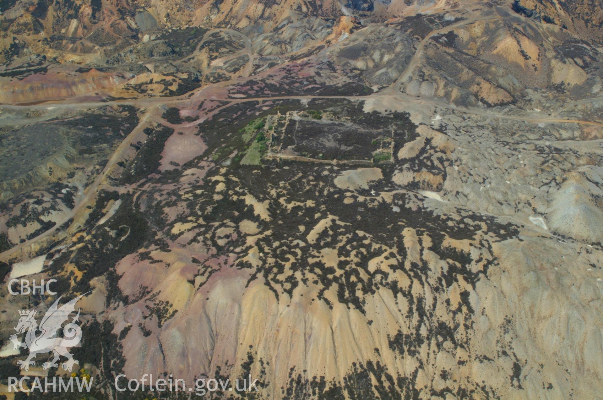 RCAHMW colour oblique aerial photograph of outline of buildings, Parys Mountain. Taken on 26 May 2004 by Toby Driver