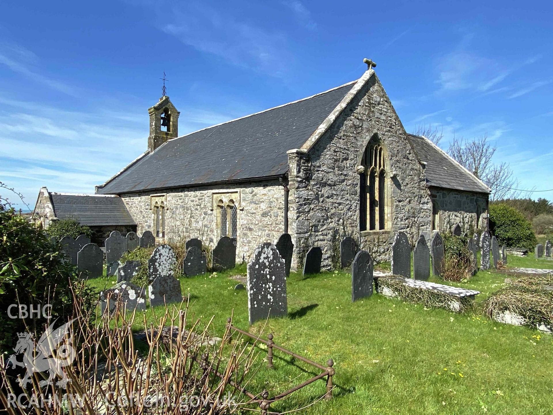 Digital photograph showing exterior rear elevation of St Dwywe's Church, Llanddwywe-Is-y-Craig, produced by Paul Davis in 2023